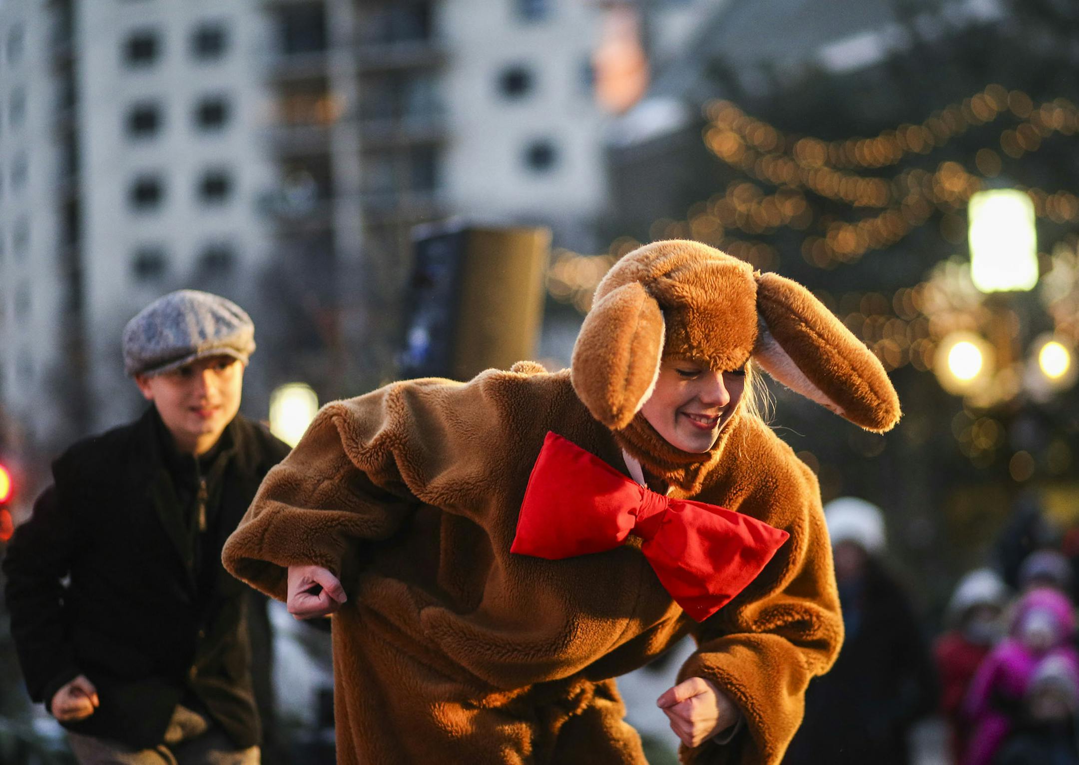 This is the first year of the reimagined Holidazzle, where it's Holidazzle Village, rather than the Holidazzle parade. Here,members of the Collide Theatrical Dance Co. dance out The Velveteen Rabbit during story time on the Holidazzle Stage Friday, Nov. 28, 2014. Among the members are Jami Snively as the Velveteen Rabbit and Andrew Imm as the boy.](DAVID JOLES/STARTRIBUNE)djoles@startribune This is the first year of the reimagined Holidazzle, where it's Holidazzle Village, rather than the Holida