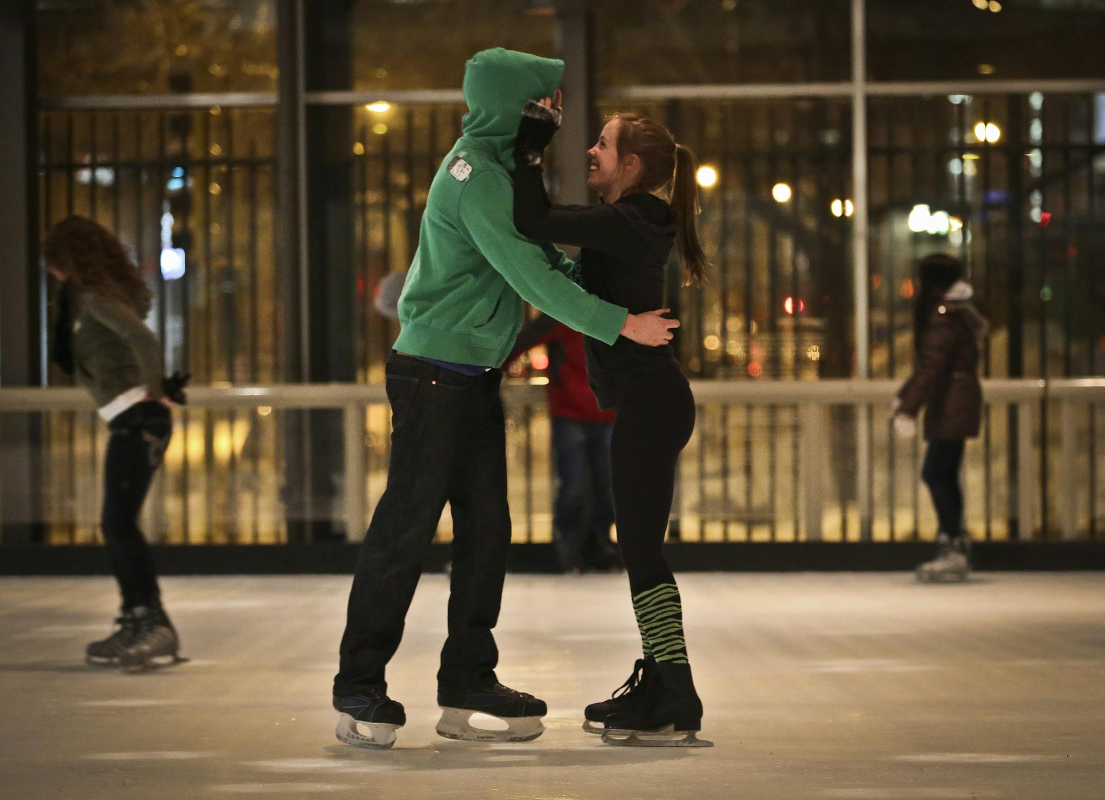 A couple had a romantic moment on the ice while skating at the Minneapolis Depot ice skating rink in Minneapolis, Minn., on Wednesday, January 2, 2013.