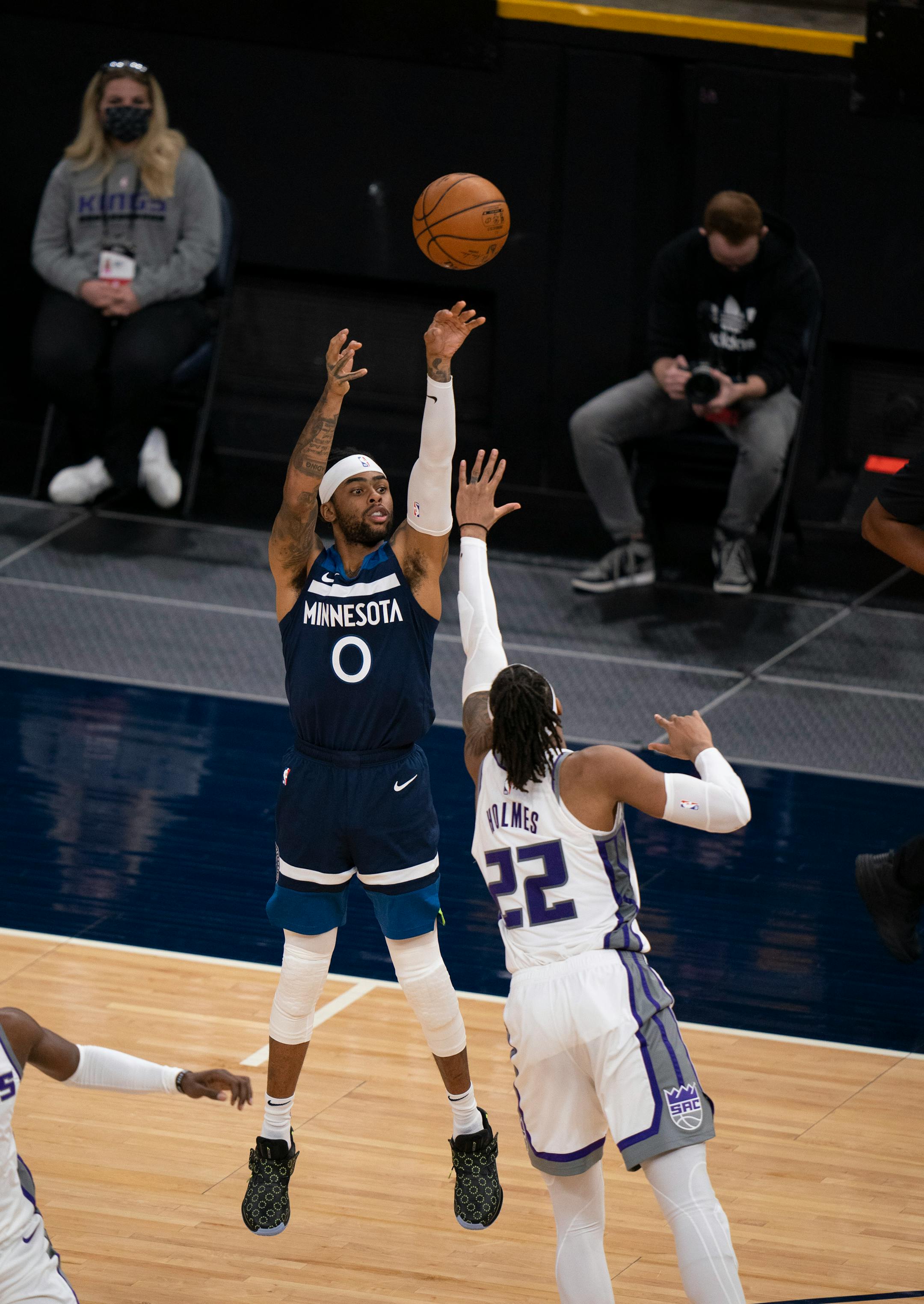 Minnesota Timberwolves guard D'Angelo Russell (0) sunk a three point shot over Sacramento Kings center Richaun Holmes (22) in the fourth quarter.