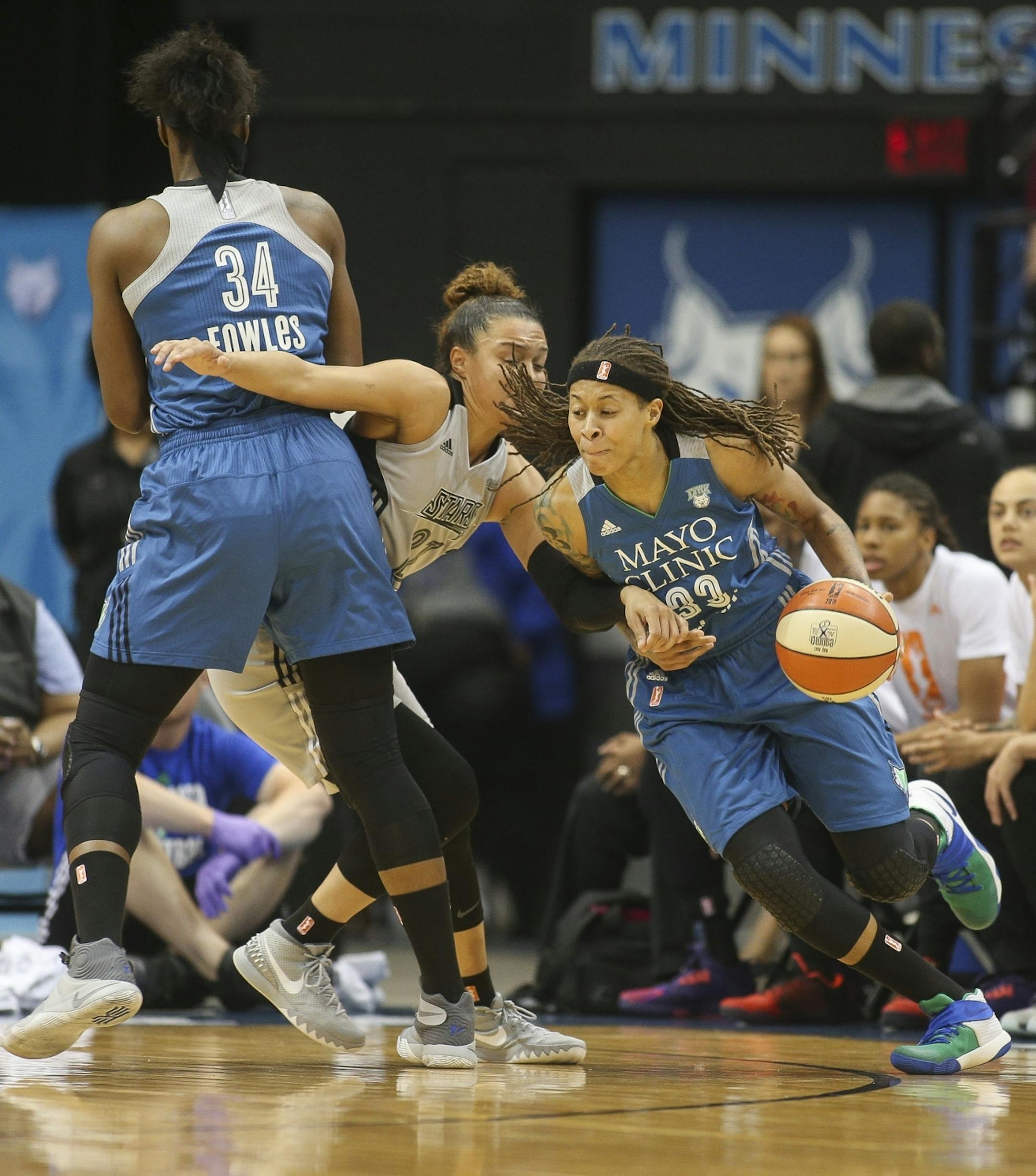 Minnesota Lynx guard Seimone Augustus (33) gets help on the the screen from Minnesota Lynx center Sylvia Fowles (34).