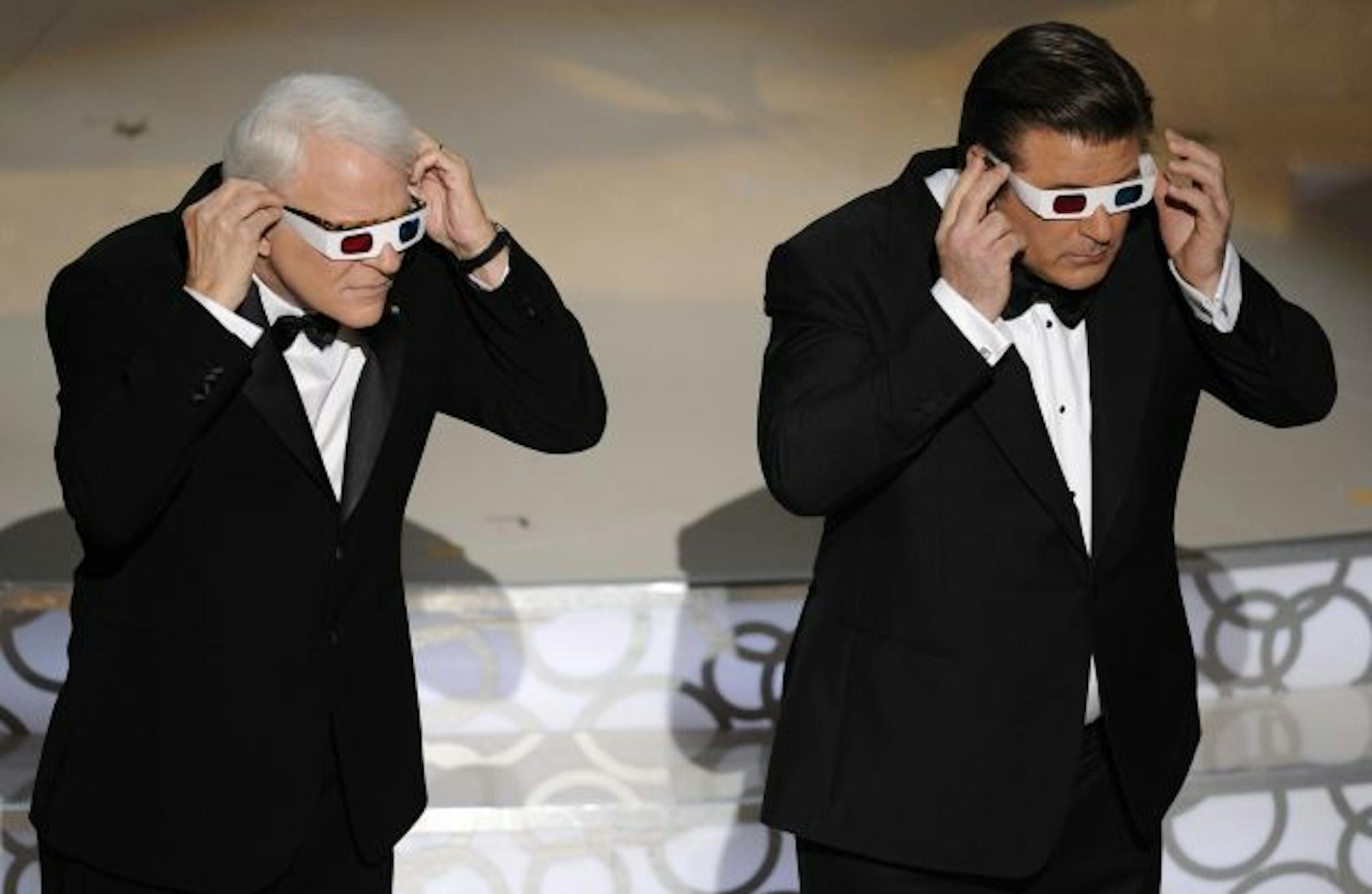 Host Alec Baldwin, right, and Steve Martin are seen on stage at the 82nd Academy Awards Sunday, March 7, 2010, in the Hollywood section of Los Angeles.