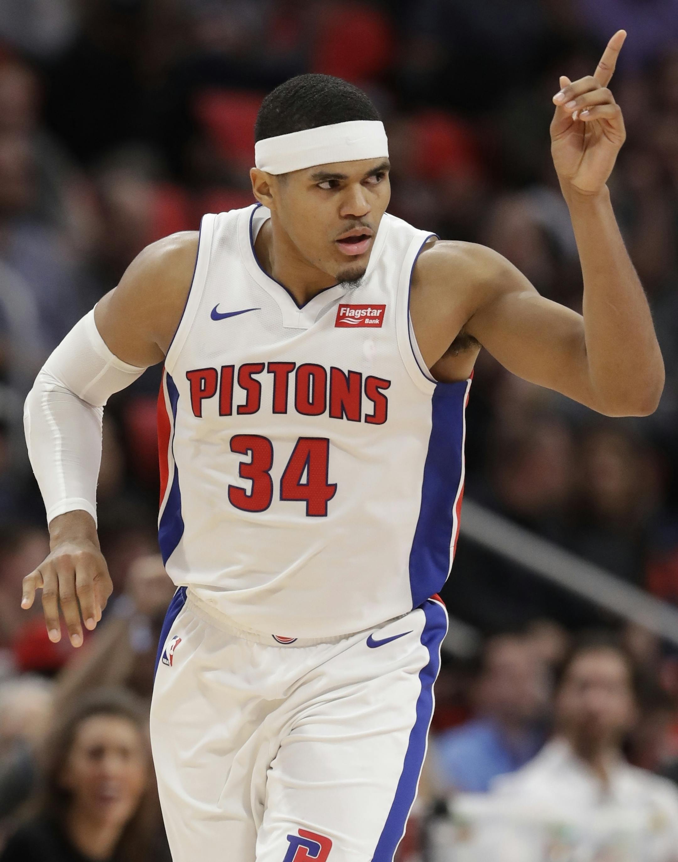 Detroit Pistons forward Tobias Harris points after a three point basket during the second half of an NBA basketball game against the Indiana Pacers, Wednesday, Nov. 8, 2017, in Detroit. (AP Photo/Carlos Osorio)