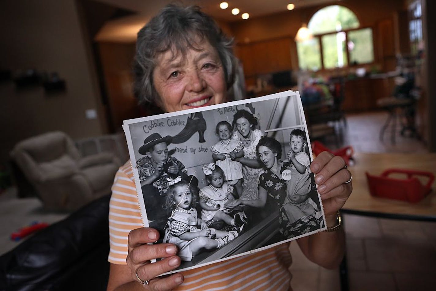 Quads were so rare in 1950, when Marti Seifert Anderson and her siblings were born, that they attracted media attention and drew crowds at the State Fair, where they were on display. Anderson is standing at the top of the old photo.