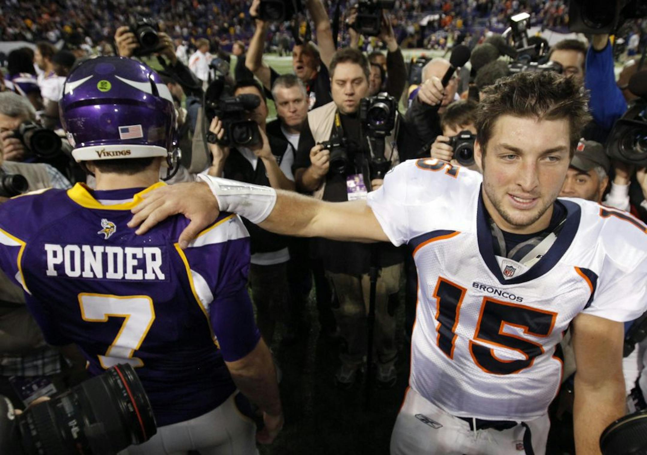 CARLOS GONZALEZ • cgonzalez@startribune.com
Their teams were headed in vastly different directions after Vikings quarterback Christian Ponder and the Broncos' Tim Tebow left the field after their postgame handshake Sunday at Mall of America Field.