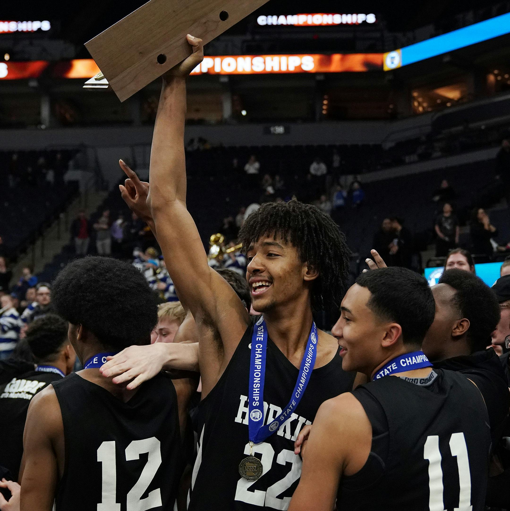 Hopkins forward Ezekiel Nnaji (22) celebrated the win over Lakeville North with his student section at the end of the second half. ] ANTHONY SOUFFLE &#x2022; anthony.souffle@startribune.com Lakeville North High School played Hopkins High School in MSHSL Class 4A boys' basketball championship game Saturday, March 23, 2019 at the Target Center in Minneapolis.