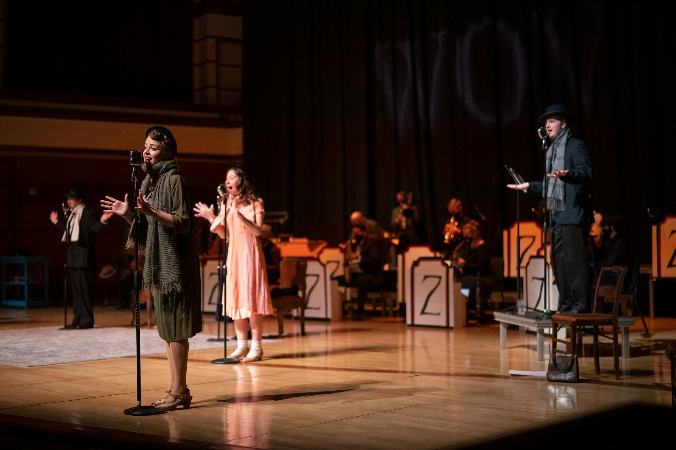 The cast of the Bethel University production of The 1940's Radio Hour, included, from left, Ellie Sammon, Theresa Drexler, and Seth Haskin.