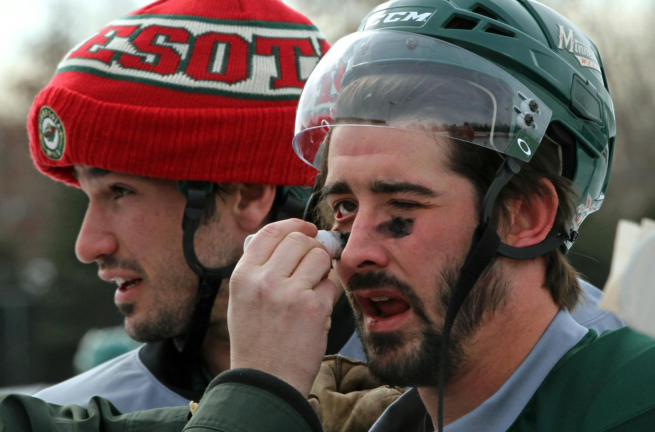 Wild forward Cal Clutterbuck (right)