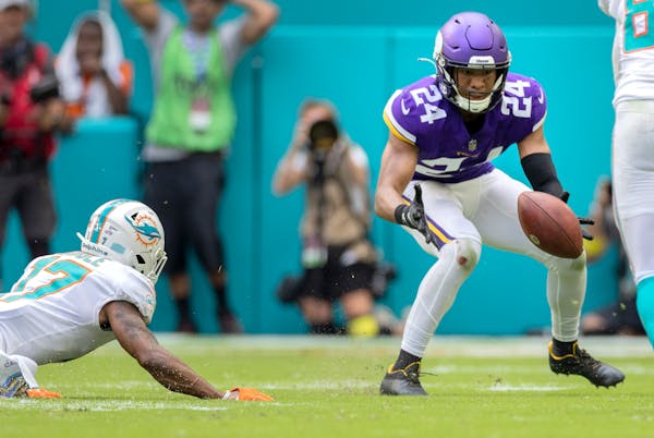 Vikings safety Camryn Bynum recovered a Jaylen Waddle fumble in the fourth quarter on Sunday against the Dolphins.