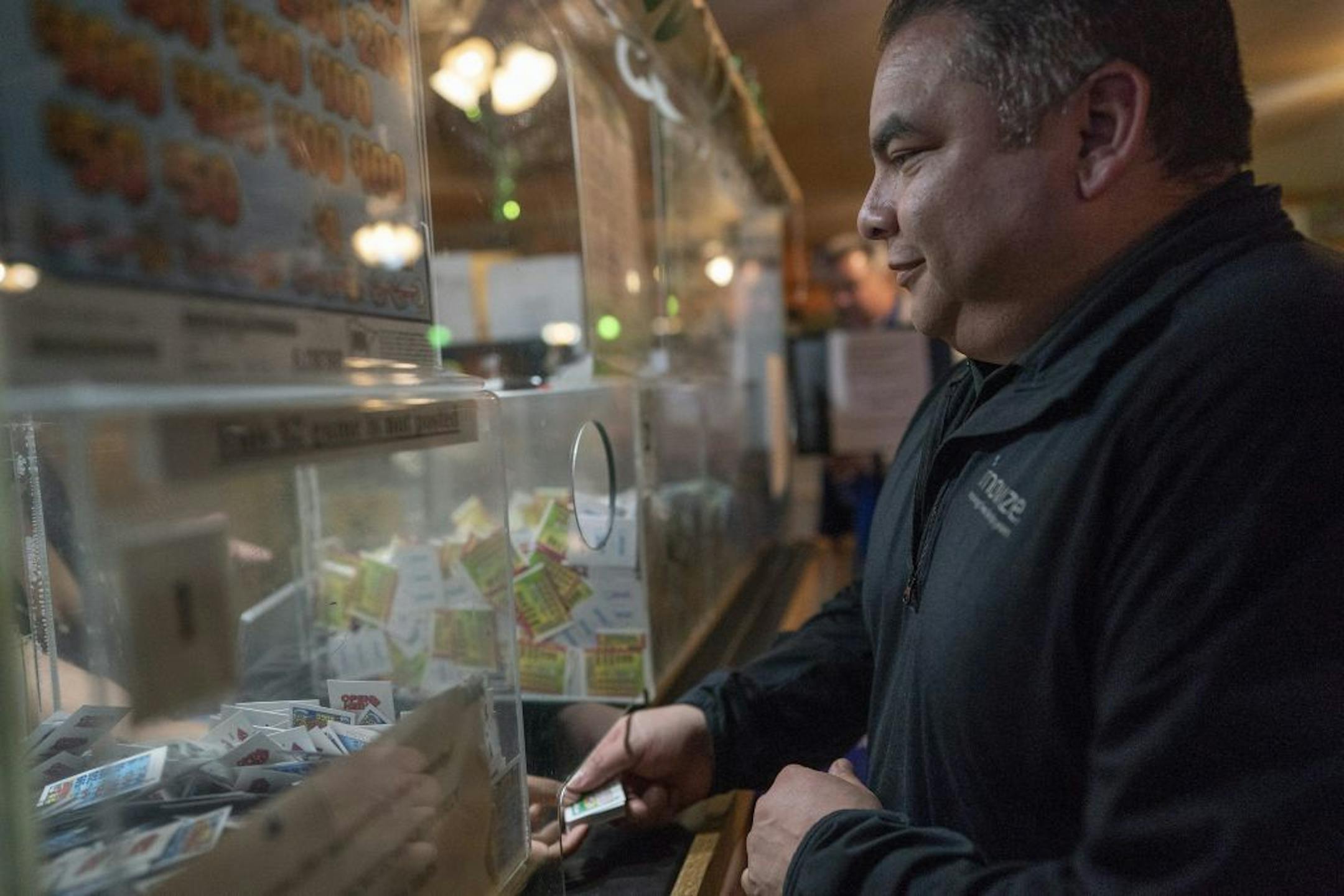 Victor Hernandez of Highland Park purchased forty dollars of pull tabs Wednesday March 6, 2019 at Skinner's Bar in St.Paul, MN.