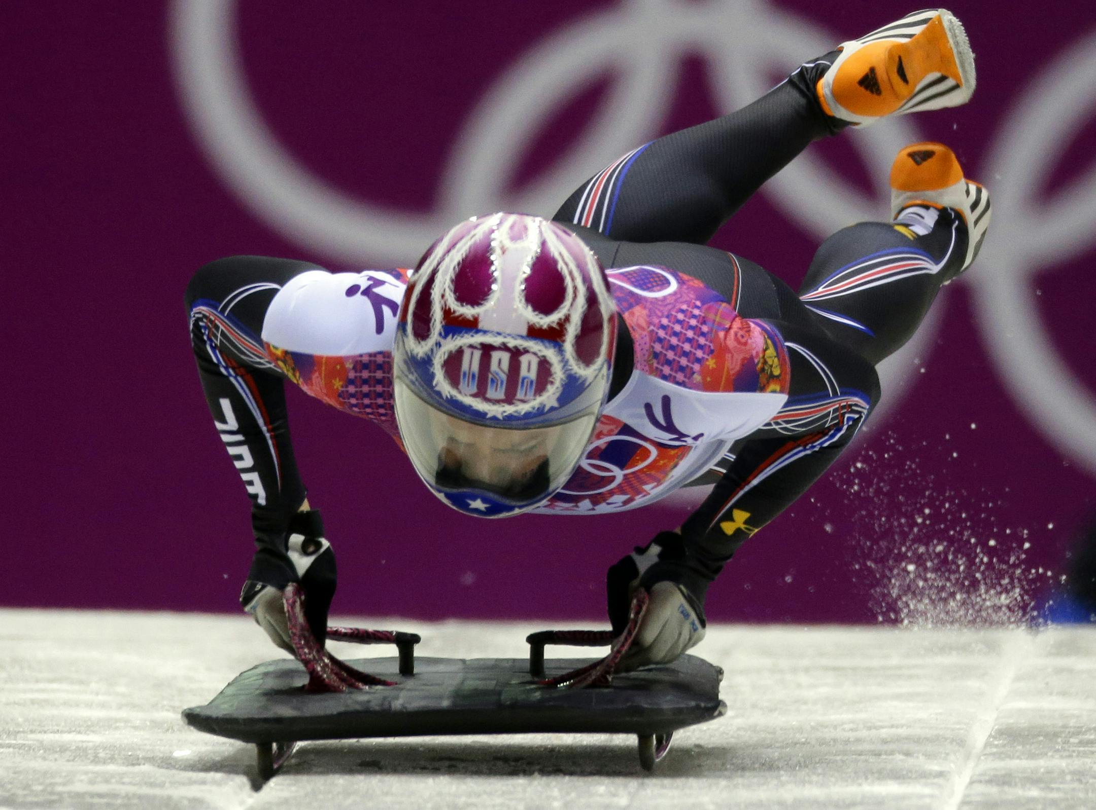 Noelle Pikus-Pace of the United States starts her final run during the women's skeleton competition at the 2014 Winter Olympics, Friday, Feb. 14, 2014, in Krasnaya Polyana, Russia. Pikus-Pace won the silver medal. (AP Photo/Natacha Pisarenko) ORG XMIT: MIN2014022011521263