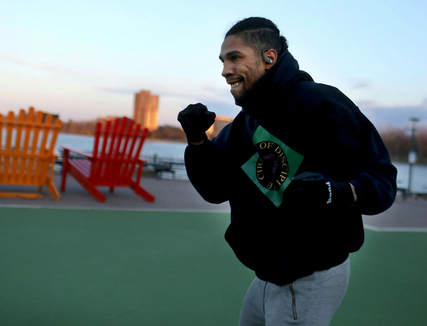 Welterweight boxer and Minneapolis resident Jamal James, whose professional record is 25-1 and who boxes out of Circle of Discipline gym, is seen during his morning workout around Bde Maka Ska Park Thursday, April 9, 2020, in Minneapolis, MN. James had a title fight that was scheduled for this weekend postponed because of the Coronavirus.] DAVID JOLES &#x2022; david.joles@startribune.com What are Minnesota fights doing without any fights?**Jamal James,cq