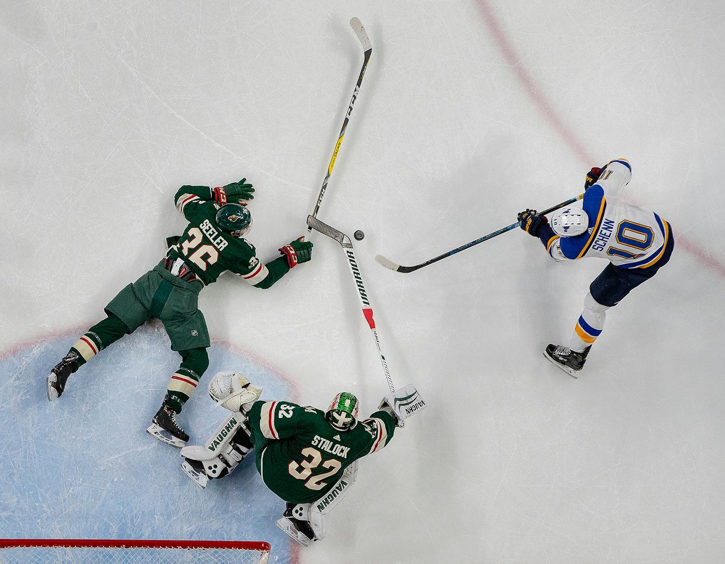 The Blues' Brayden Schenn (10) got the puck past Wild defenseman Nick Seeler and goalie Alex Stalock for a goal in the second period Sunday.