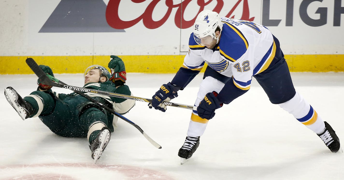 Minnesota Wild's Nino Niederreiter (22) and St. Louis Blues' David Backes (42) collide during the first period on Monday, April 20, 2015, at Xcel Energy Center in St. Paul, Minn. (Carlos Gonzalez/Minneapolis Star Tribune/TNS) ORG XMIT: 1166948 ORG XMIT: MIN1504202026084006