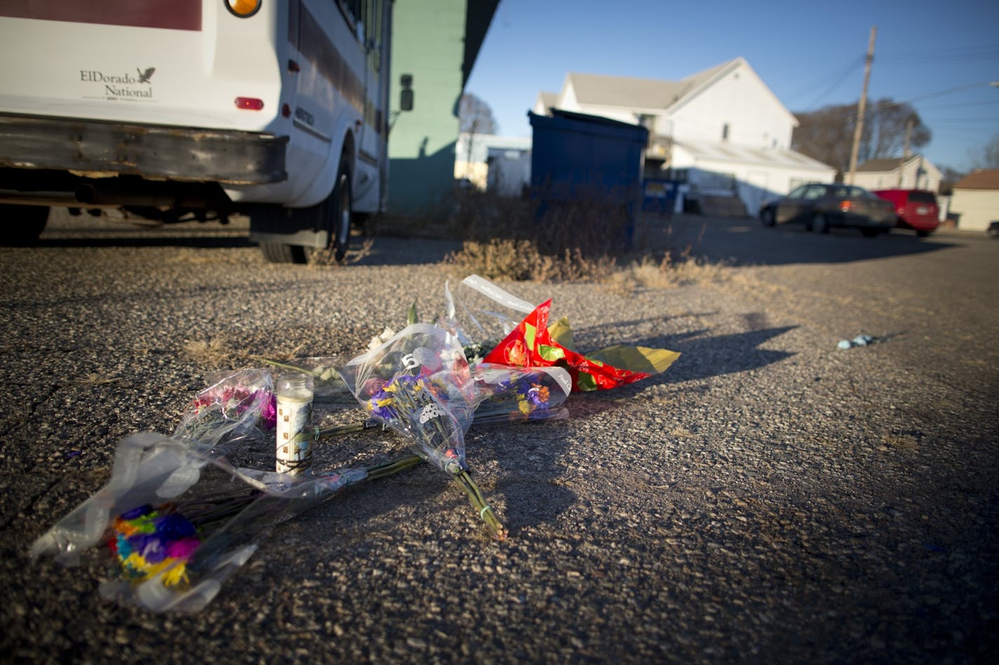 a small memorial was left for Officer Tom Decker, who was shot and killed on the job last week, behind the bar likely near where he was shot and killed in Cold Spring, Minn., on Tuesday, December 4, 2012. The bar is at right.