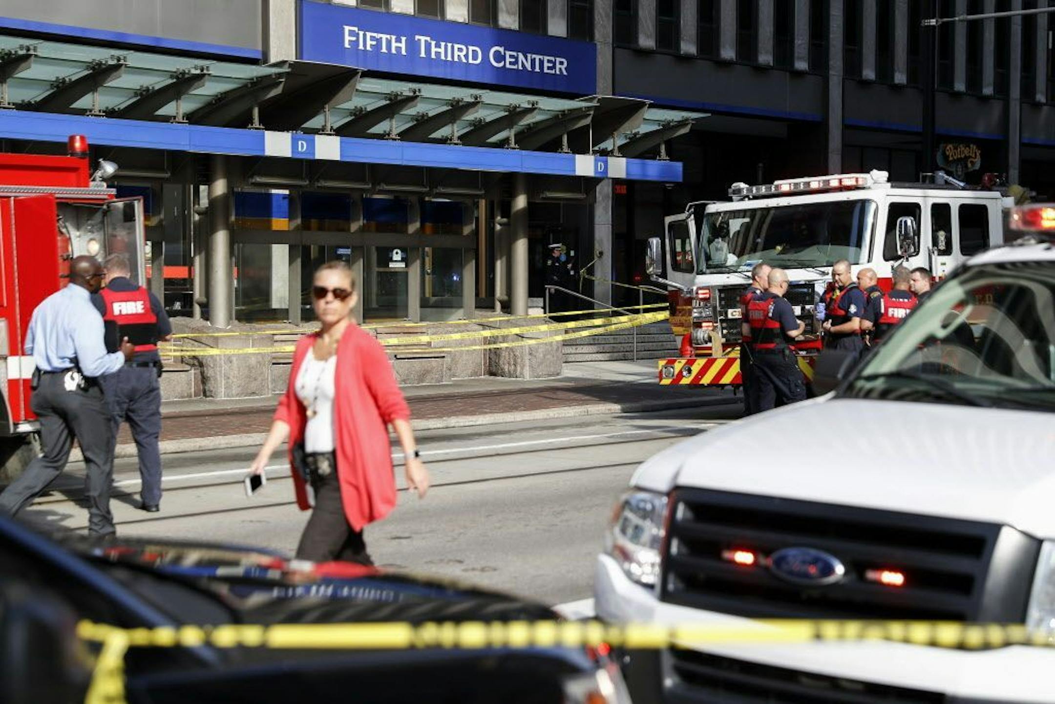 Emergency personnel and police respond to a reported active shooter situation near Fountain Square, Thursday, Sept. 6, 2018, in Cincinnati.