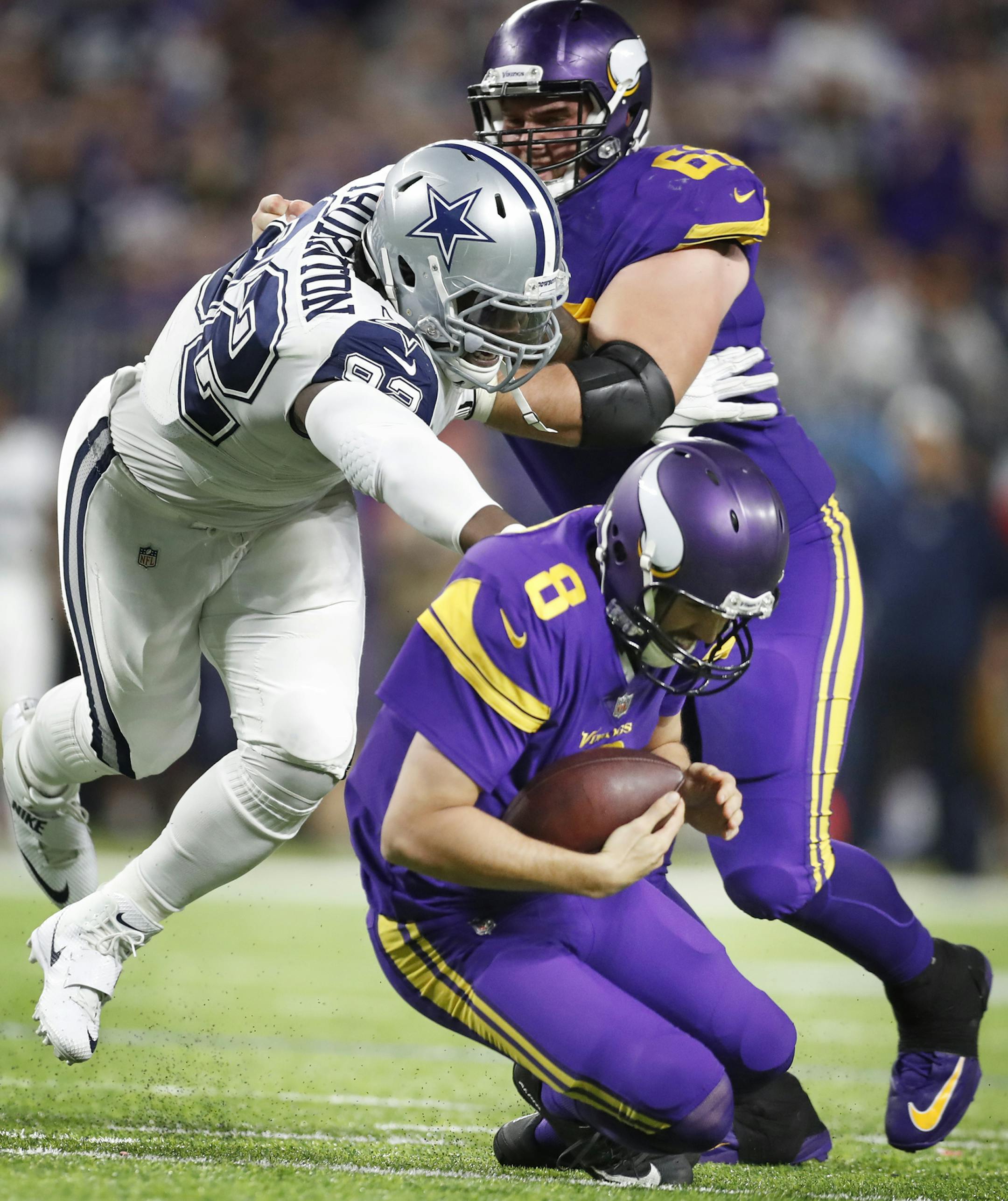 Dallas Cowboys defensive tackle Cedric Thornton (92) sacked Minnesota Vikings quarterback Sam Bradford (8) in the forth quarter at U.S. Bank Stadium Thursday December 01,2016 in Minneapolis MN. The Minnesota Vikings hosted the Dallas Cowboys ] Jerry Holt / jerry. Holt@Startribune.com