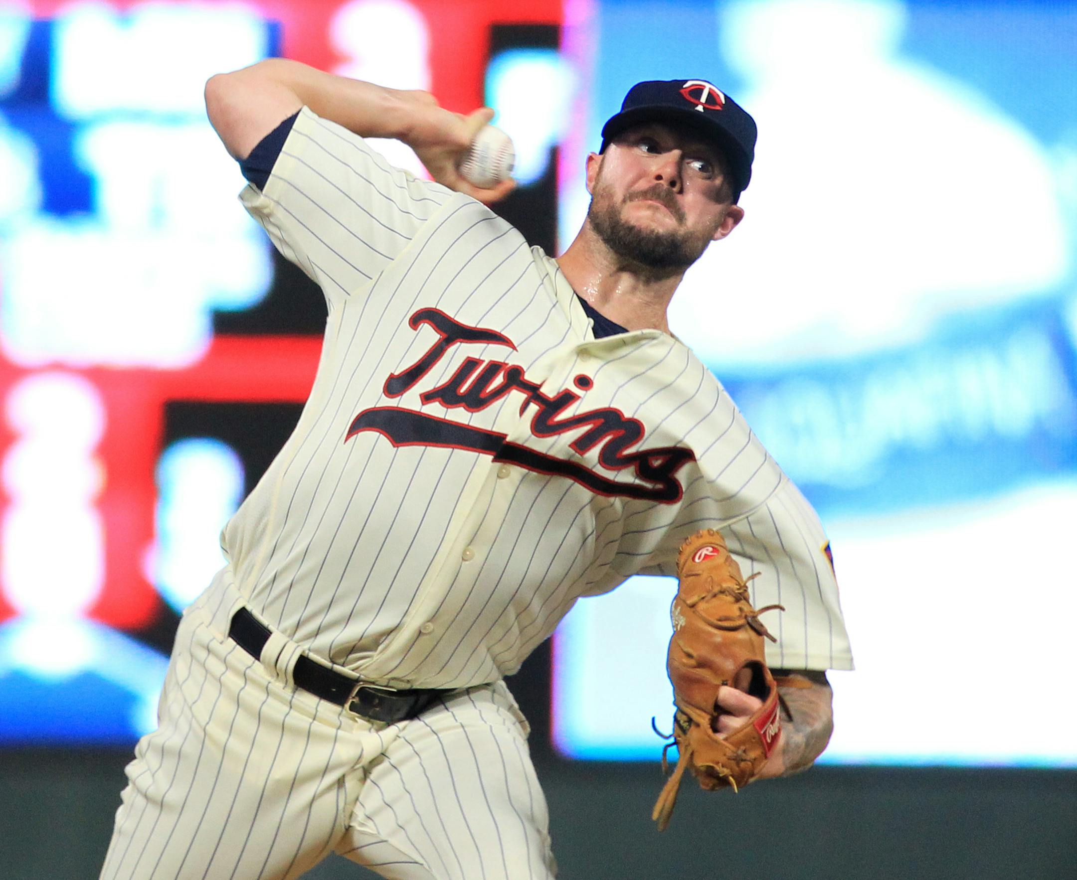 Minnesota Twins pitcher Ryan Pressly (57) throws during the seventh inning against the Texas Rangers in a baseball game Saturday, Aug. 5, 2017 in Minneapolis. The Rangers won 4-1. (AP Photo/Andy Clayton-King)