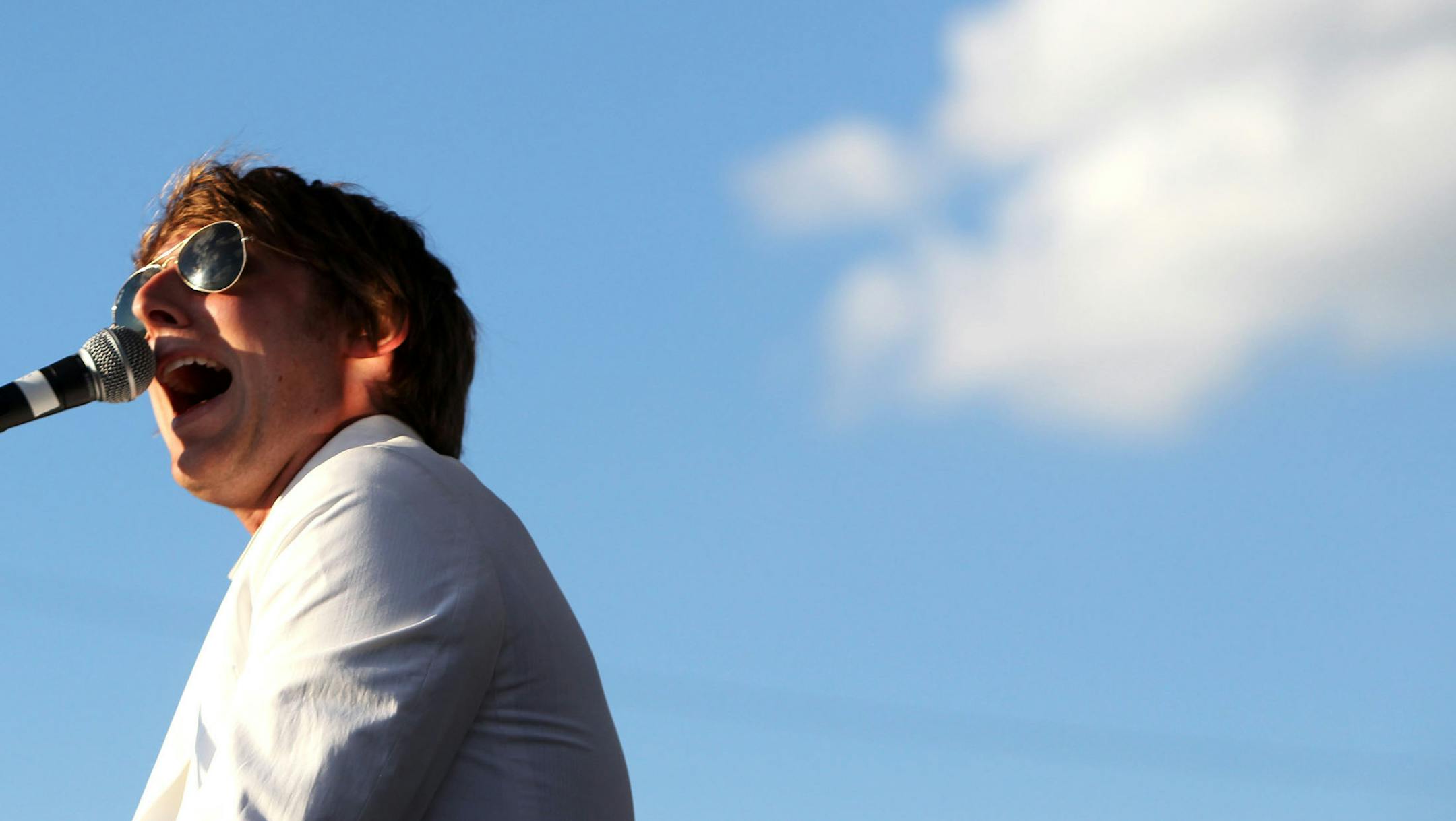 DAVID JOLES ¬• djoles@startribune.com Minneapolis, MN - July 9, 2010- Eric Hutchinson performs on the Sun Country stage during the 15th annual Basilica Block Party. In this photo:] ORG XMIT: MIN2013060411581949
