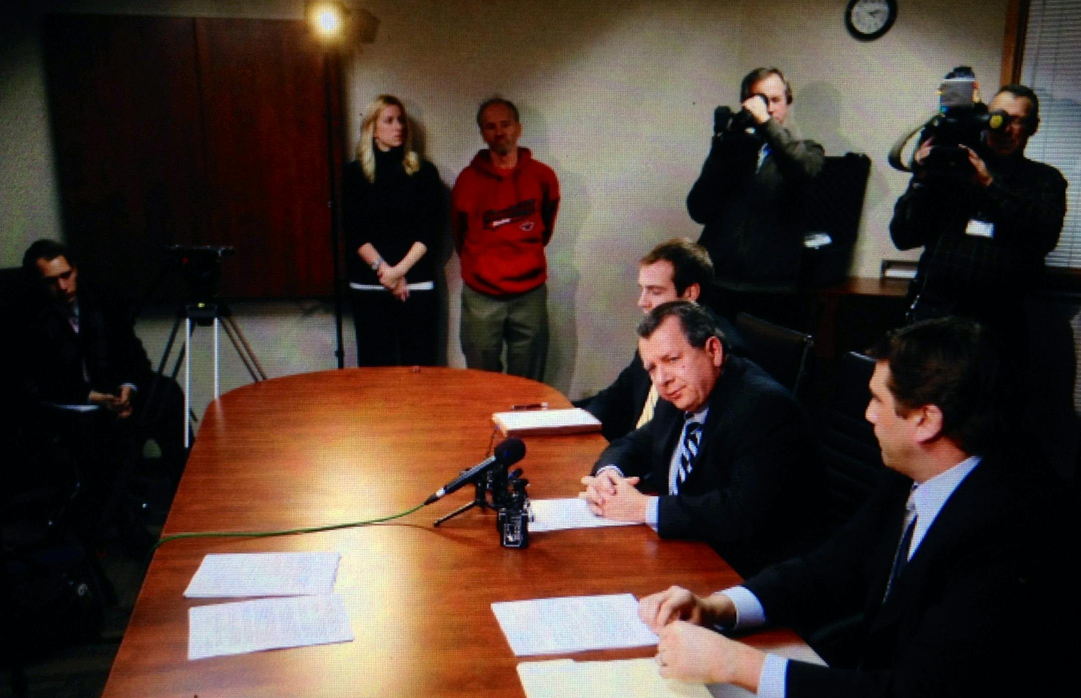 This is Philip Villaume (center) and Jeffrey Schiek (right) of the Villaume & Schiek P.A. Law firm.