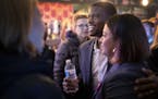 St. Paul Mayor Melvin Carter joined those at Black Hart of St. Paul celebrating as the yes forces won in the vote of the city's trash-collection syste