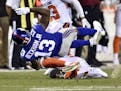 New York Giants wide receiver Odell Beckham (13) is tackled by Cleveland Browns strong safety Briean Boddy-Calhoun (20) in the first half of an NFL pr