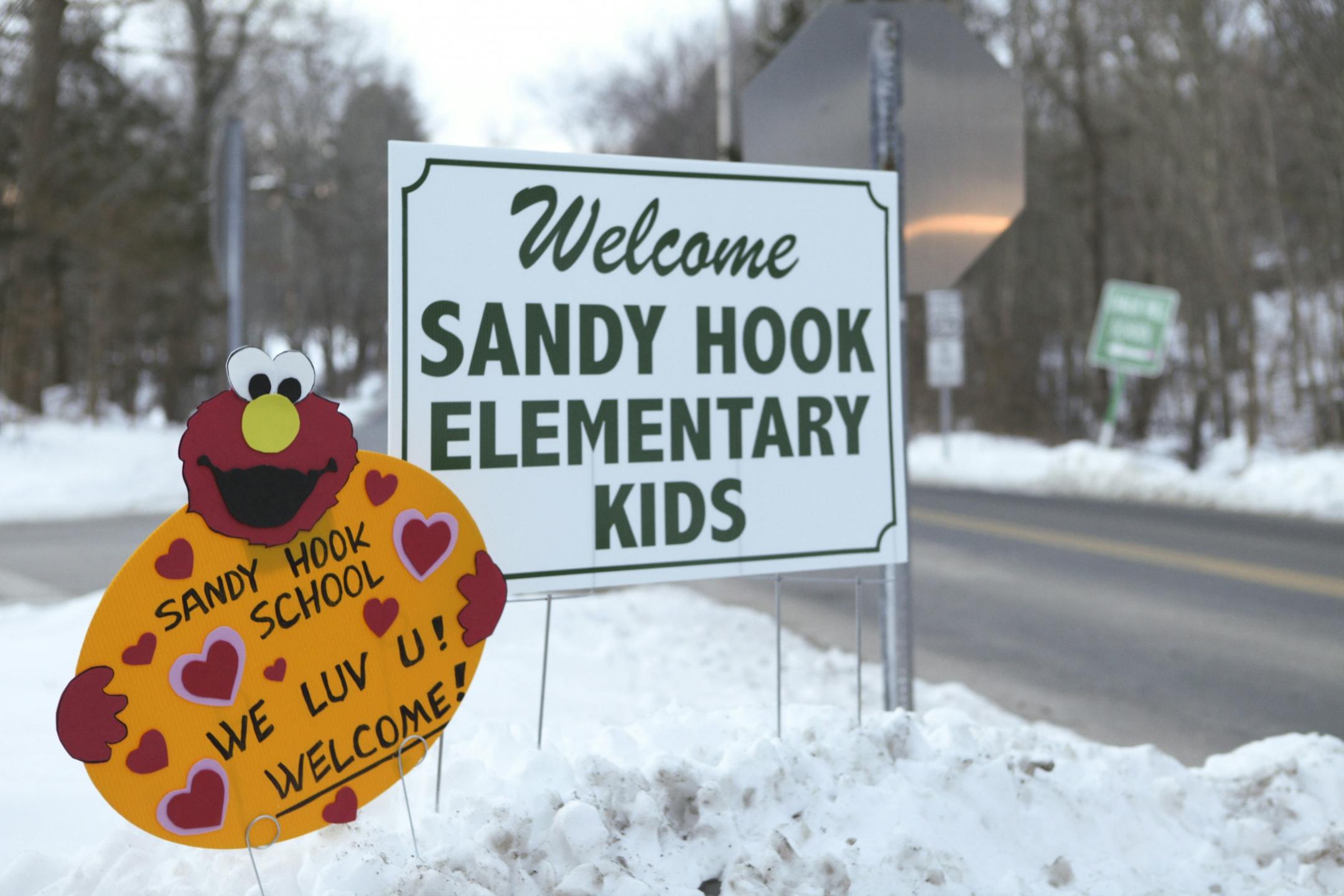 Signs welcoming students from Sandy Hook Elementary School near the Chalk Hill Middle School in Monroe, Conn., Jan. 3, 2012. Twenty first graders and six faculty members were shot dead in December.