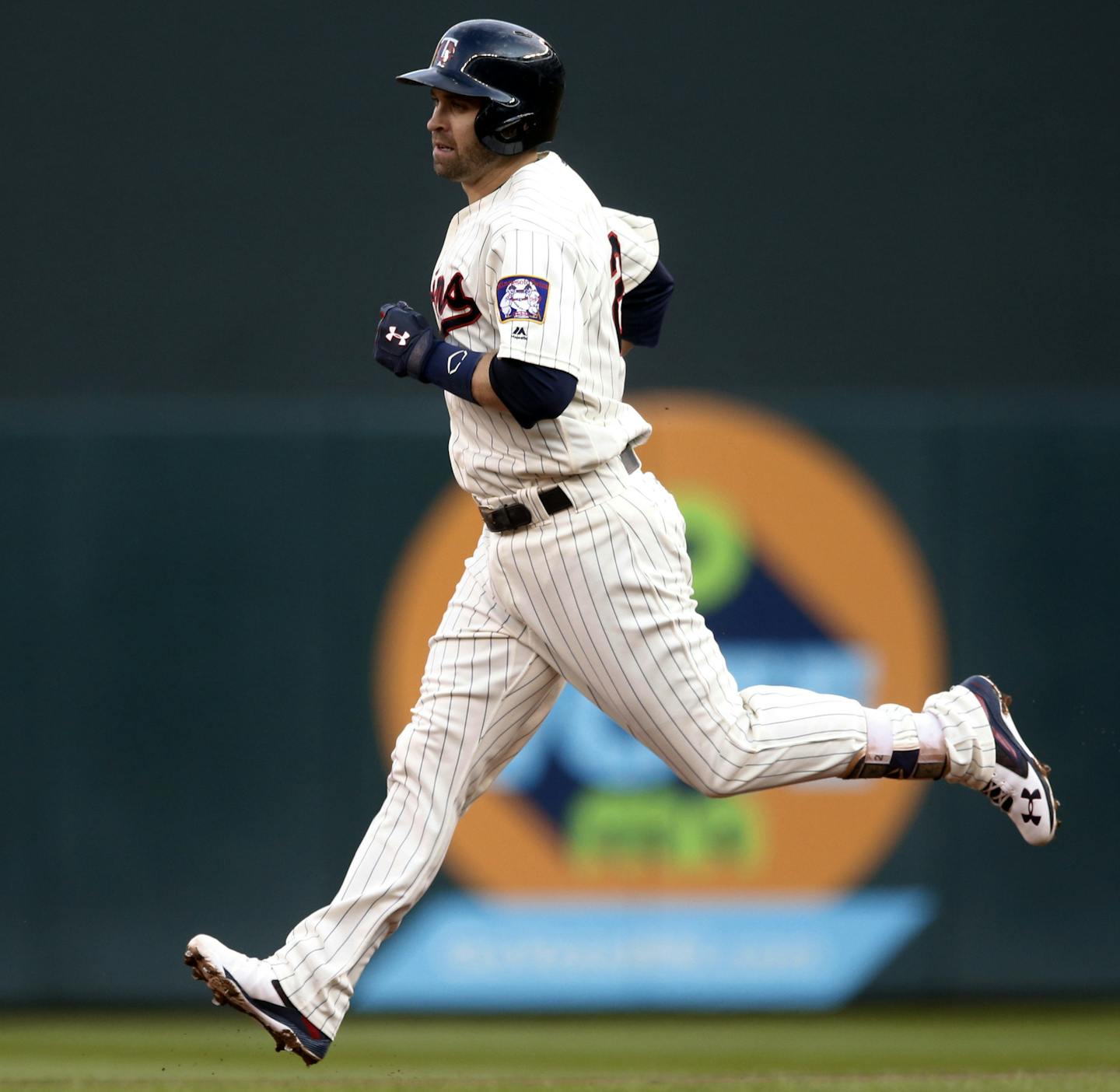 Minnesota Twins' Brian Dozier jogs the base path on his solo home run off Chicago White Sox pitcher James Shields in the first inning of a baseball game Saturday, Sept. 3, 2016, in Minneapolis. (AP Photo/Jim Mone)