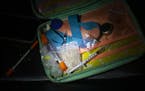 A few grams of heroine and collection of needles, some uncapped, were found by Deputy Ben Fye from the St. Louis County Sheriff's Office in a small ba