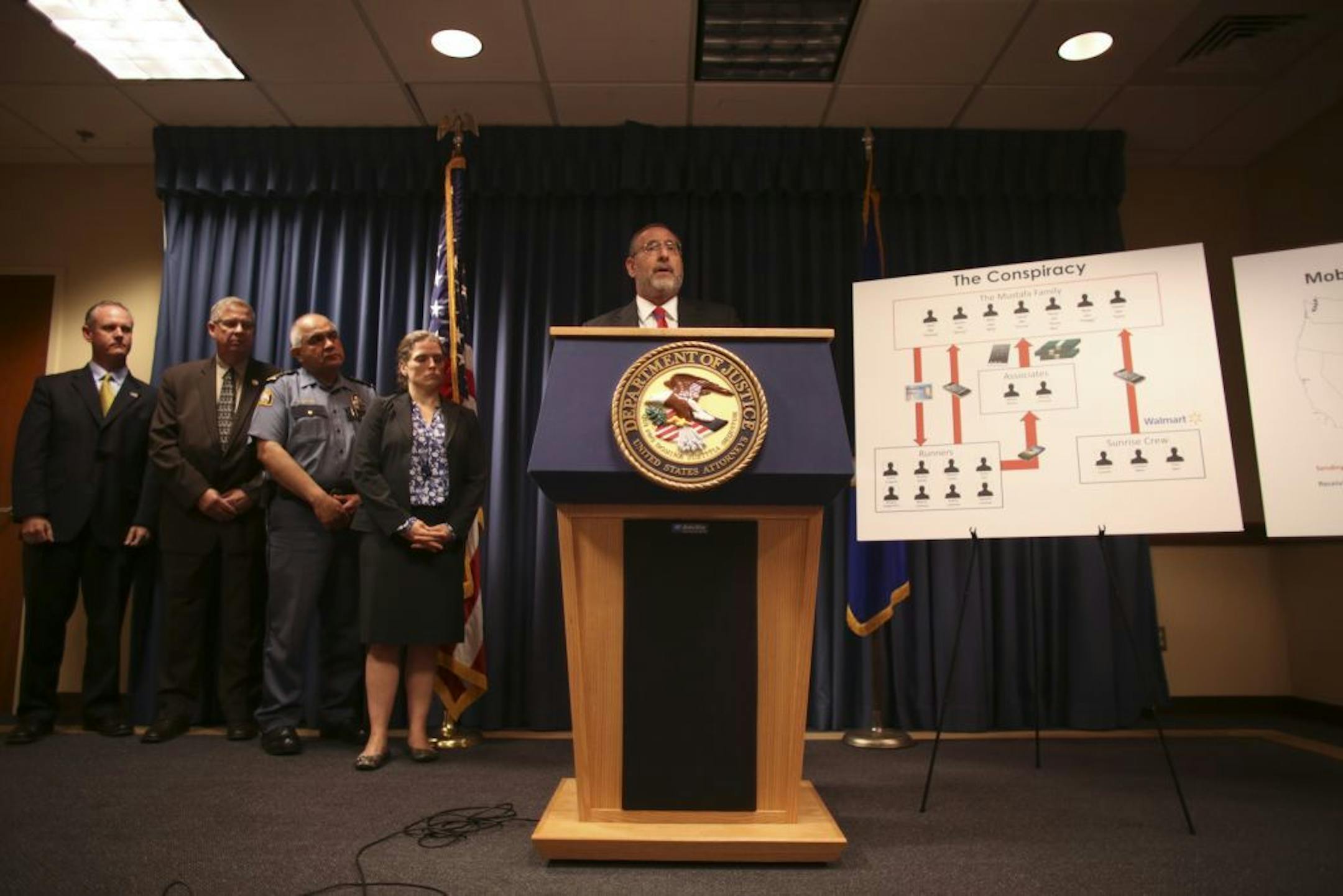 U.S. Attorney Andrew Luger at the news conference at his office in Minneapolis where he announced the breakup of a mobile device theft ring based in the Twin Cities.