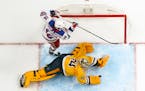 Predators goaltender Juuse Saros blocked a shot in his team’s victory over the Rangers on Saturday.
