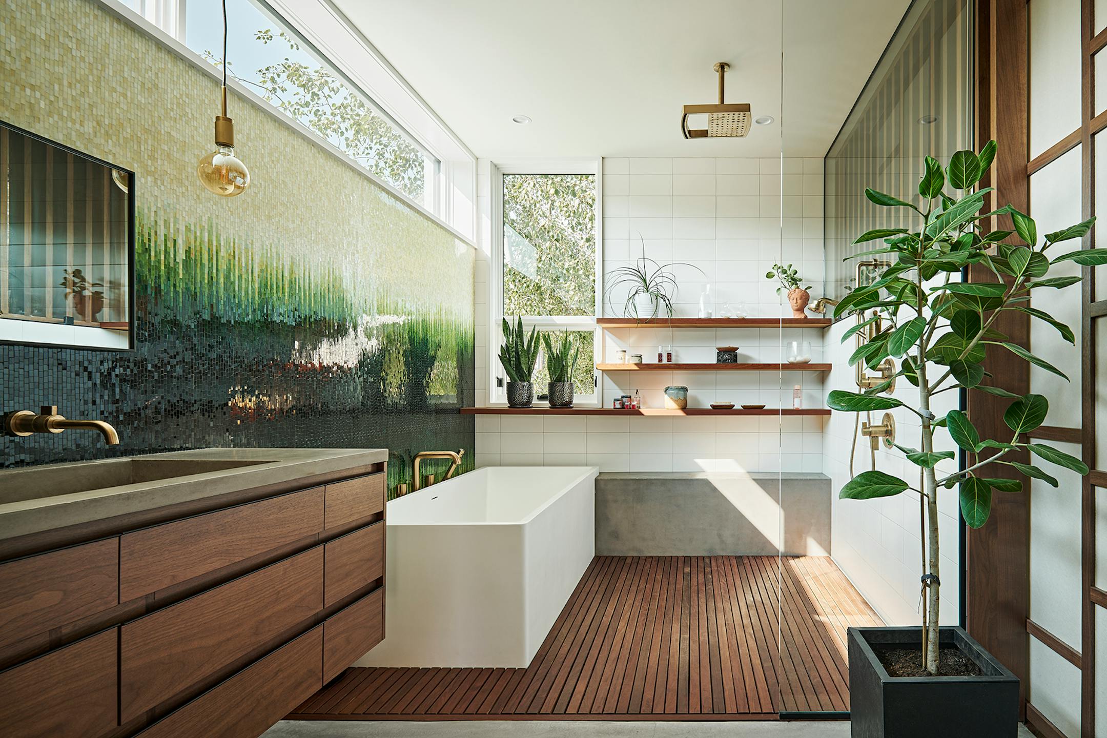 After a fire forced a remodel of a St. Louis Park home, a family hoped for a footprint similar to their original single-story ranch-style house. At the same time, they were game for introducing new, bold and unique materials and design features such as soaring rooflines and transom windows that allow light to come in and display the family's vast plant collection like never before.