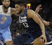 Minnesota Timberwolves center Karl-Anthony Towns, right, drives against Sacramento Kings center Willie Cauley-Stein during the second quarter of an NB