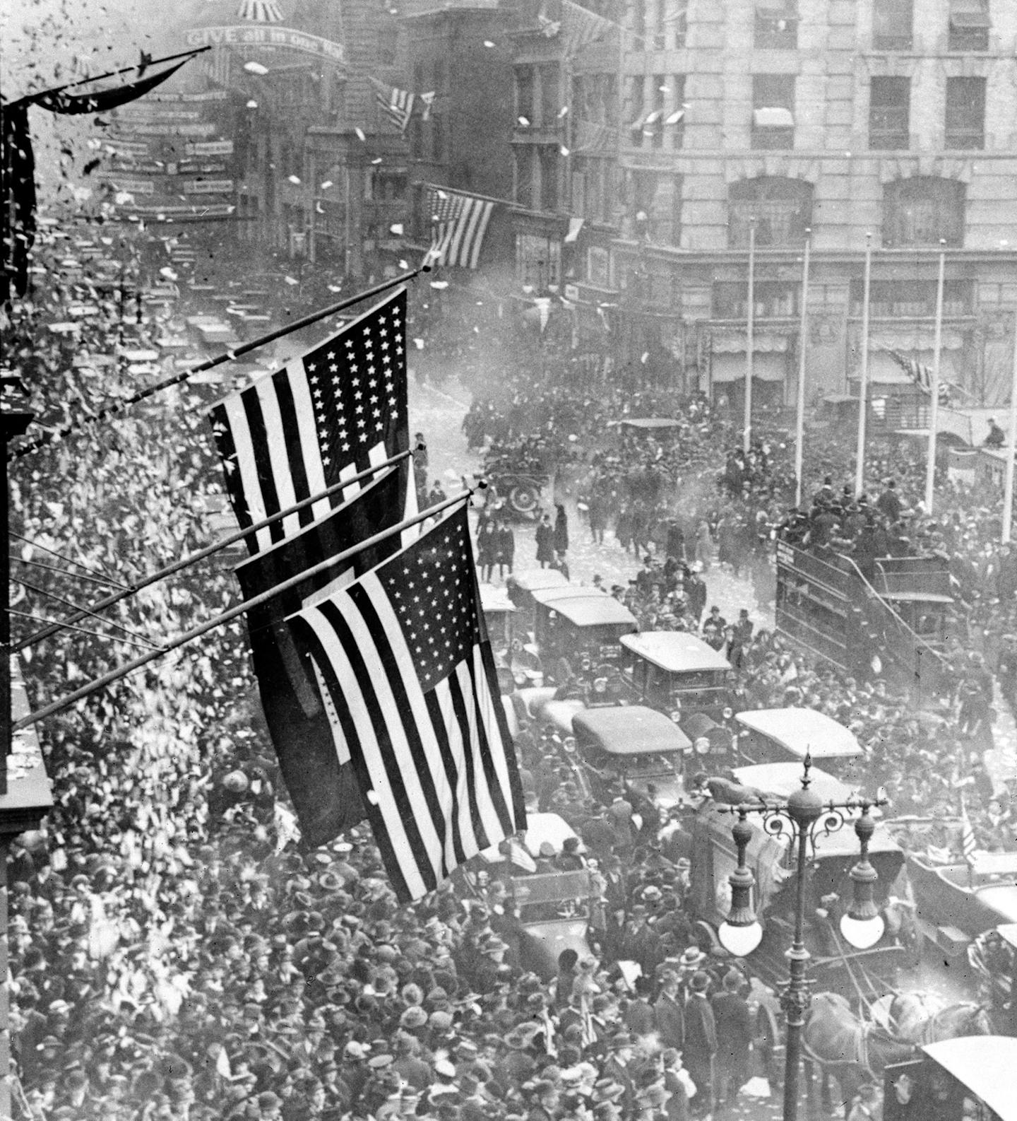 This aerial view shows a crowded New York City street as people celebrate Armistice Day on Nov. 11, 1918. (AP Photo) ORG XMIT: APHS142