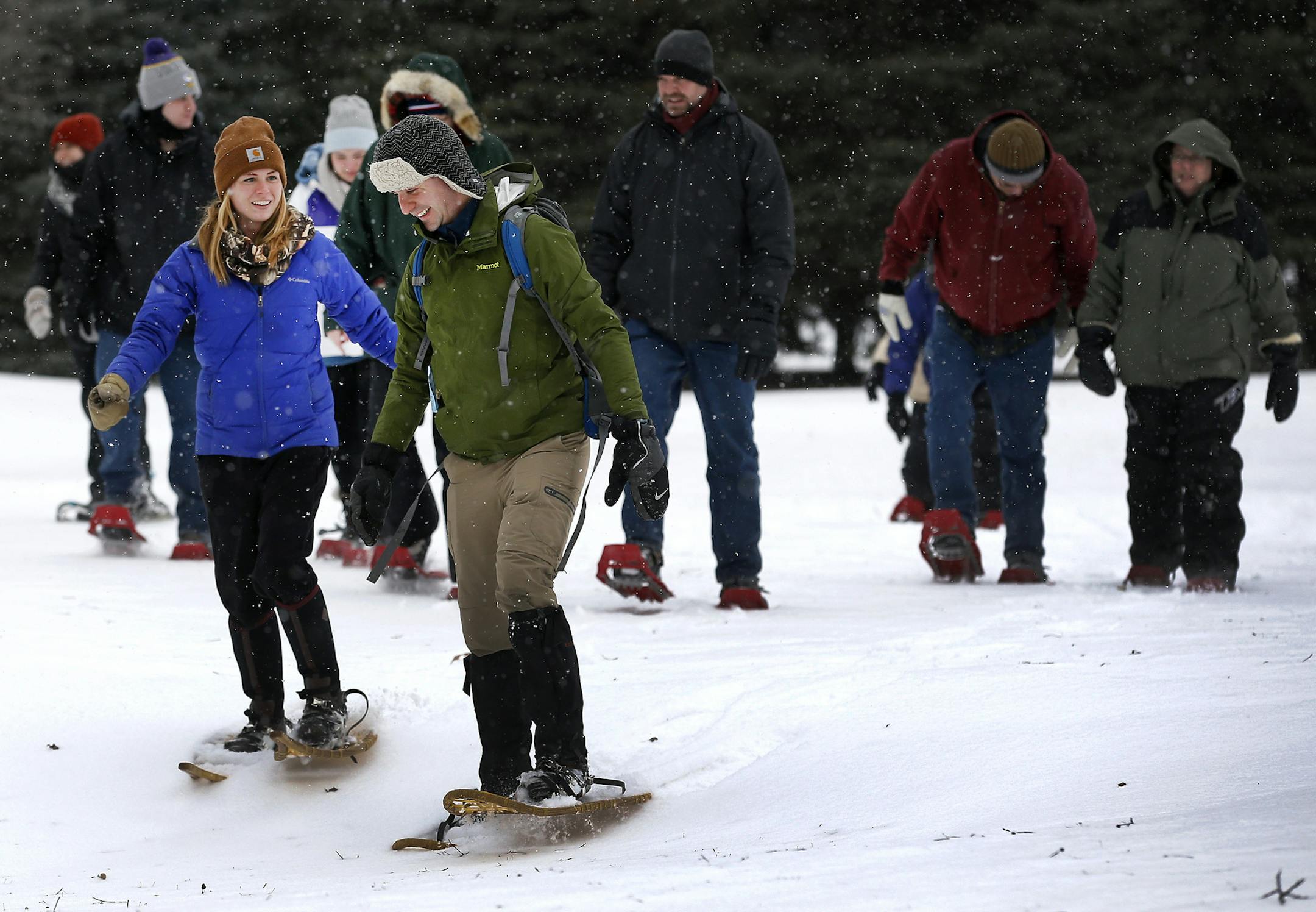 Josh Sweet program and facility specialist at Three Rivers Park District and his wife Jill led a Valentine Snowshoe walk at the New Prague Golf Club on Sunday. ] CARLOS GONZALEZ cgonzalez@startribune.com - February 14, 2016, New Prague, MN, Valentine Snowshoe. Enjoy a casual snowshoe hike through the winter woods with your special someone, Three Rivers Park District, New Prague Golf Club