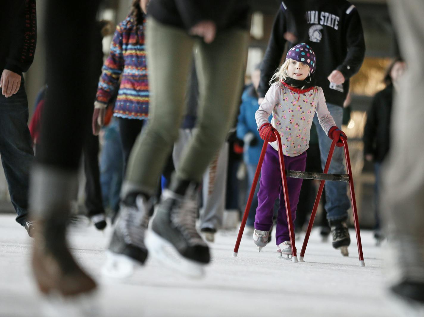 The Depot ice rink was packed with skaters including Alice Reed 5, who was skating with her father Dana Reed Sunday January 05, 2014 in Minneapolis ,MN.