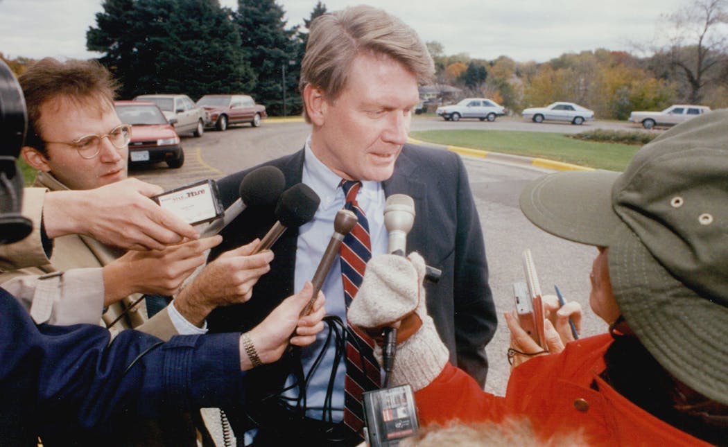 Jon Grunseth talked to reporters at the Midland Hills Country Club in Roseville on Oct. 18, 1990. 