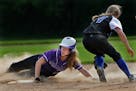 Kirsten Maygaard slides safely into second past the tag of Hopkins' Michelle Guenther. (Richard Tsong-Taatarii/Star Tribune)