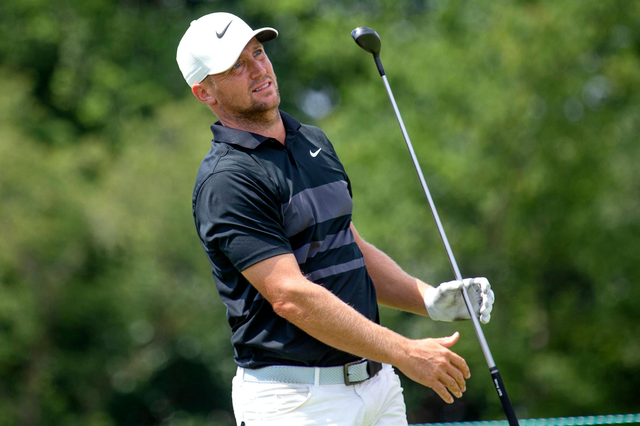 Alex Noren watches his tee shot on the 14th hole during the final round of the 3M Open golf tournament in Blaine, Minn., Sunday, July 26, 2020. (AP Photo/Andy Clayton-King)