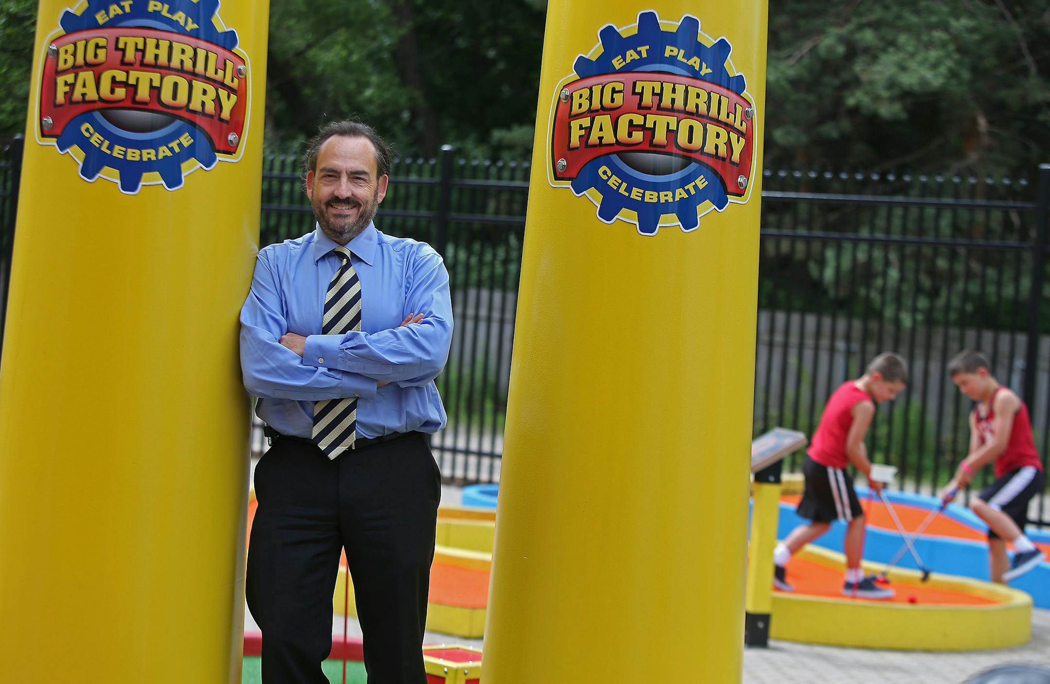 Big Three Factory owner Barry Zelickson visited the outdoor part of the former Kmart, Tuesday, July 1, 2014 in Minnetonka, MN. The business includes bumper cars, laser tag, black light wall climbing, bowling, plus mini golf, a climbing wall and other attractions outside in what was once the Kmart auto and garden centers. ] (ELIZABETH FLORES/STAR TRIBUNE) ELIZABETH FLORES &#x2022; eflores@startribune.com