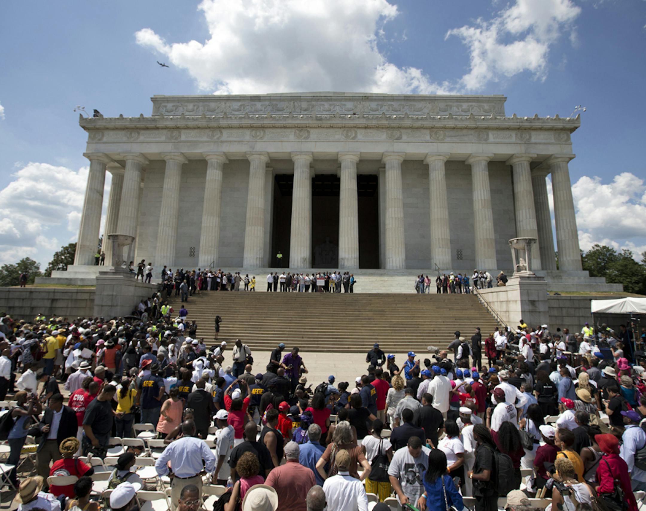 Participants gather on the steps of the Lincoln Memorial during an event to commemorate the 50th anniversary of the 1963 March on Washington, Saturday, Aug. 24, 2013, in Washington. ORG XMIT: MIN2013082416381781