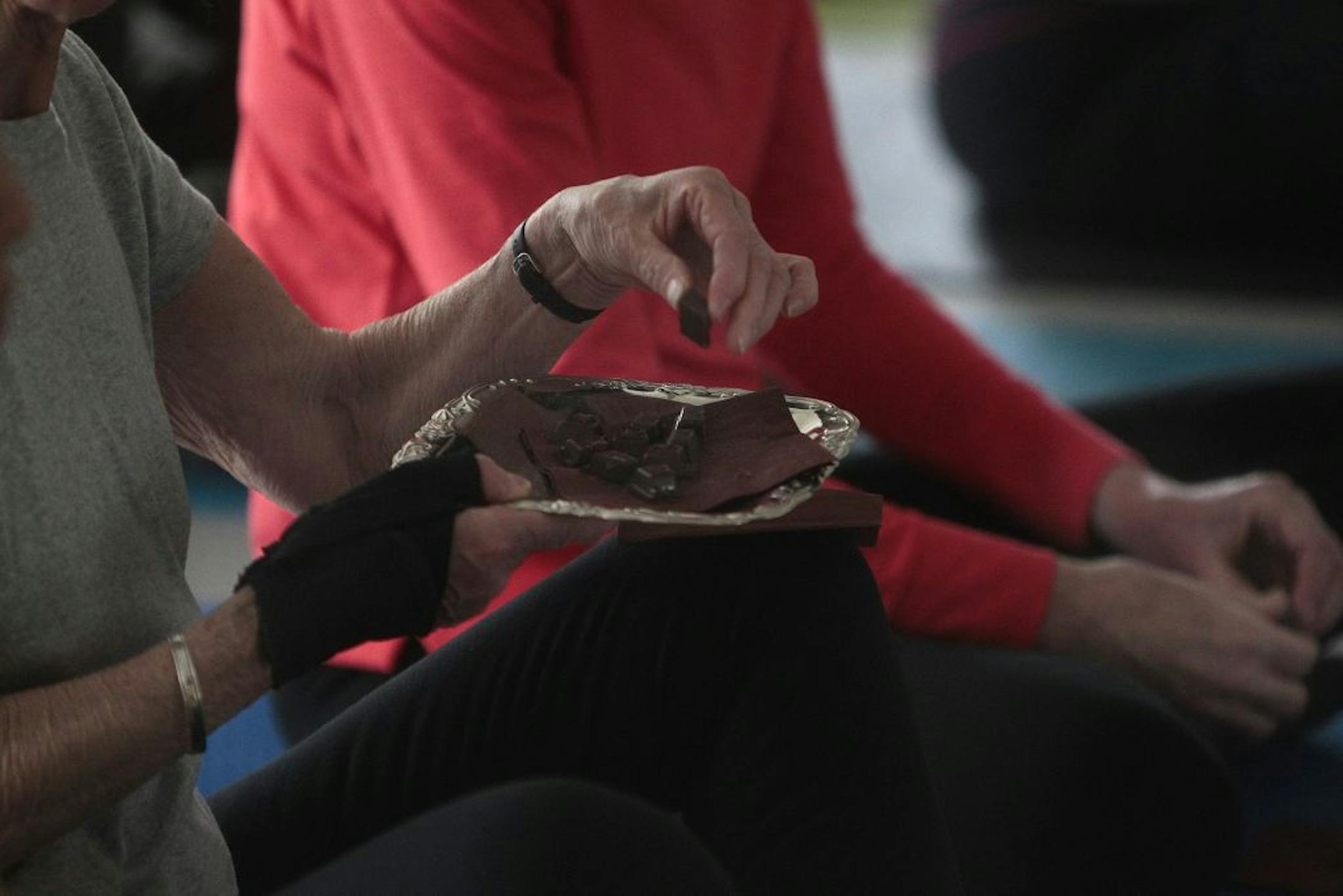 Anna Bonavita talked about chocolates (not pictured) as people in her yoga session in Minneapolis passed samples around to taste. Chocolate Bonavita is an organization devoted to a chocolate revolution, introducing people to the finest grades of chocolate which, if supported, can help restore the rain forests and even make us healthier.