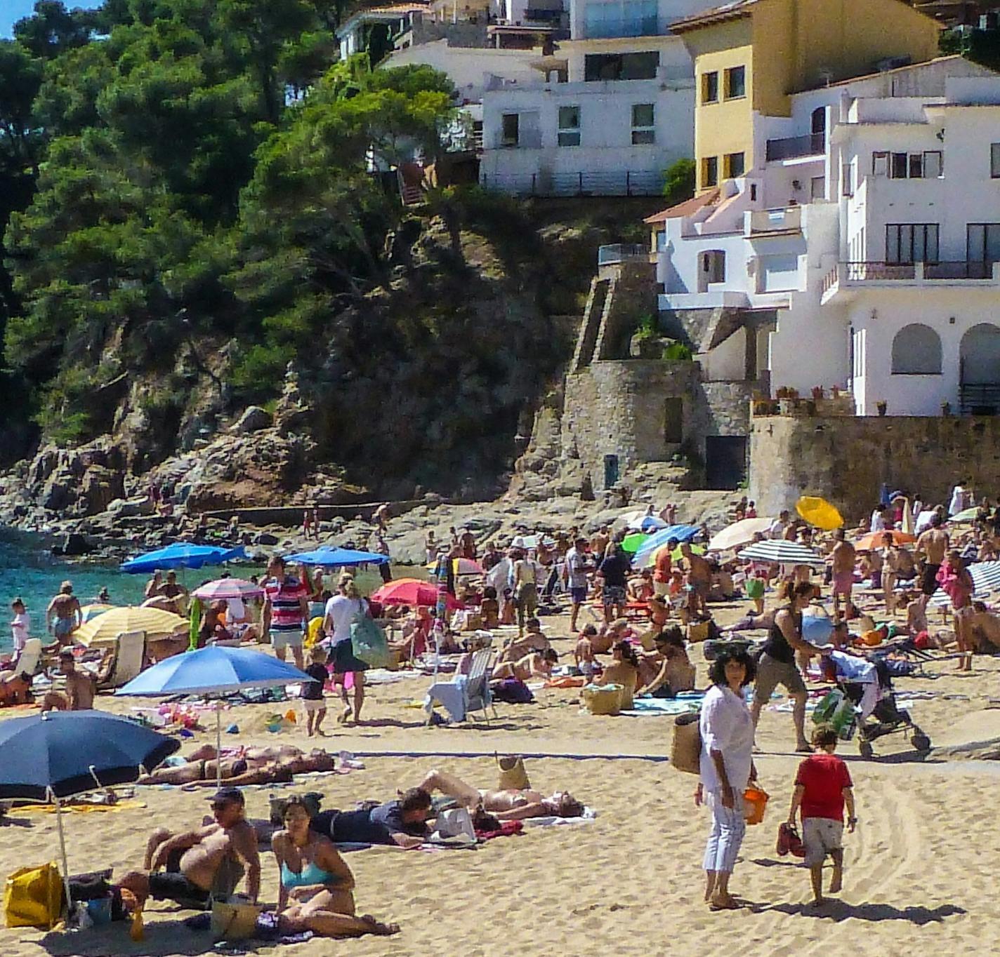 Cliffside inns, homes and restaurants climb the hill above the beach in Llfranc, Costa Brava, Catalonia, Spain. (Courtesy Steve Haggerty/Colorworld/MCT) ORG XMIT: 1151232