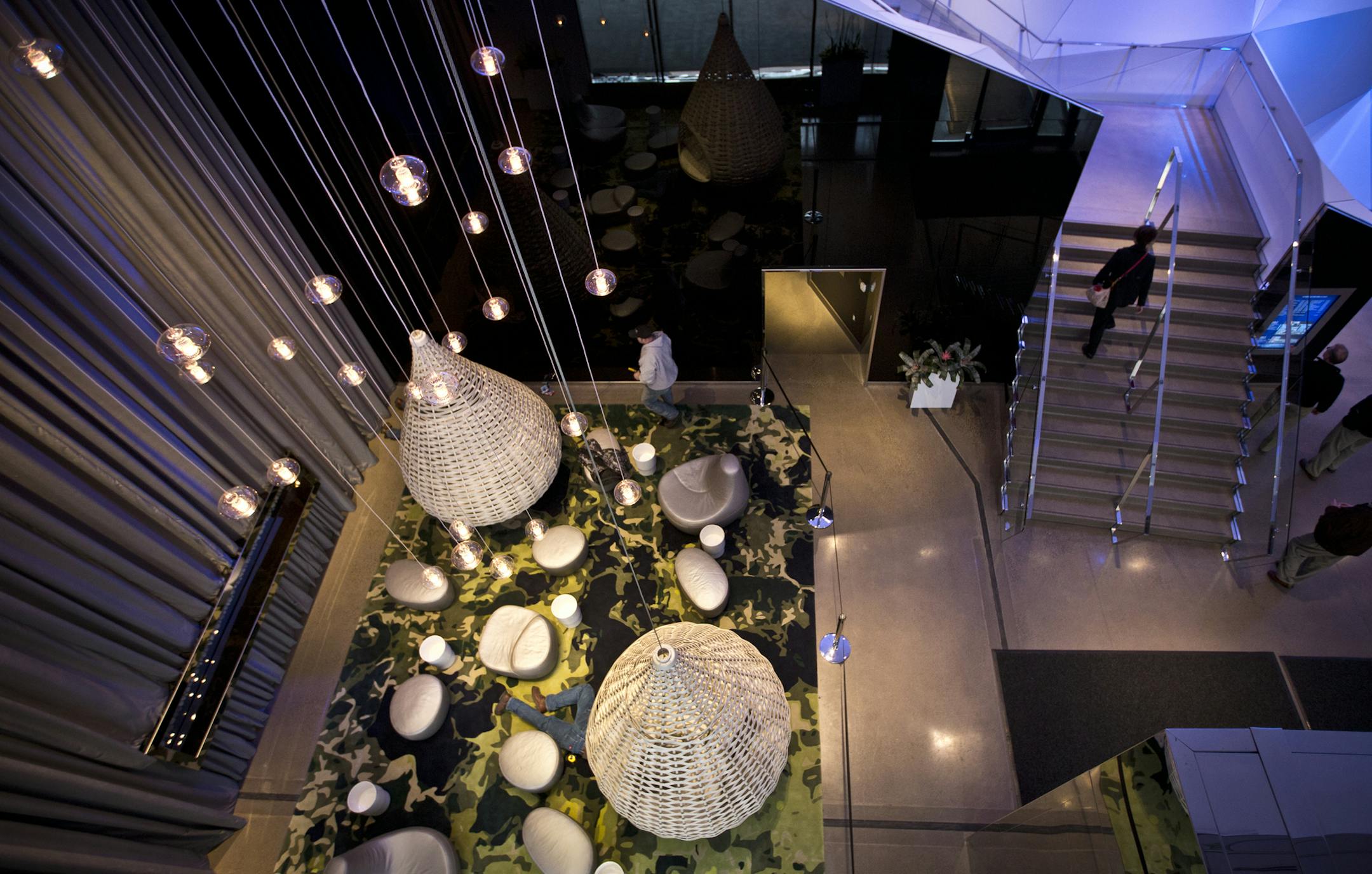 A lounge in the lobby has swings and a topographic map rug of the area at the new Radisson Blu at the Mall of America on Friday, March 15, 2013, in Bloomington, Minn. The Radisson Blu cost $137 million, has 500 rooms and is connected to the Mall of America through a skyway. ] (RENEE JONES SCHNEIDER * reneejones@startribune.com)