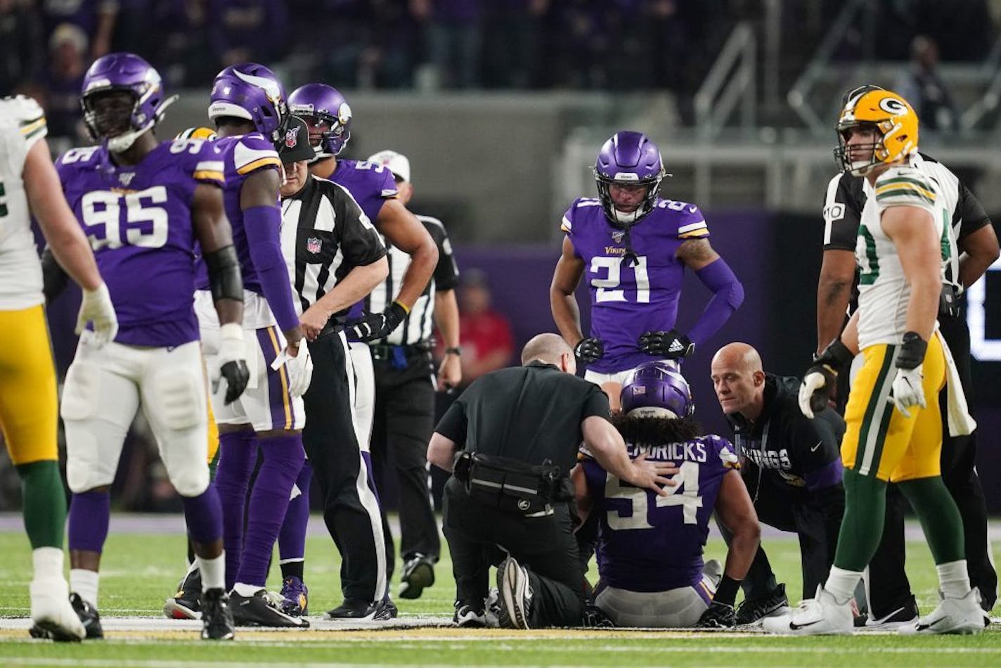 Minnesota Vikings middle linebacker Eric Kendricks (54) was treated by trainers on the field after recovering a fumble in the second quarter.