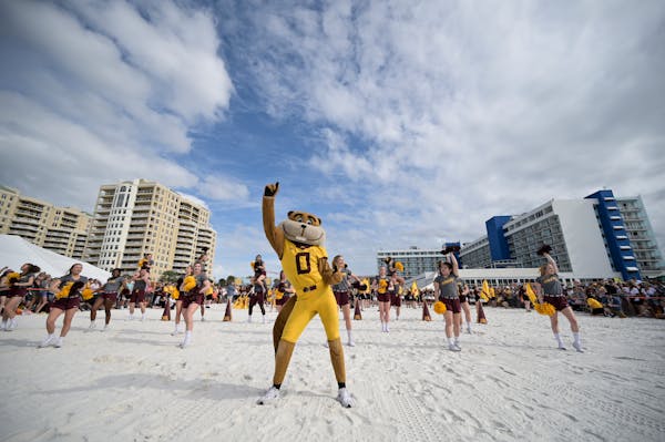 Goldy Gopher danced as the University of Minnesota marching band, color guard and cheer squad performed at Outback Bowl festivities in 2019.