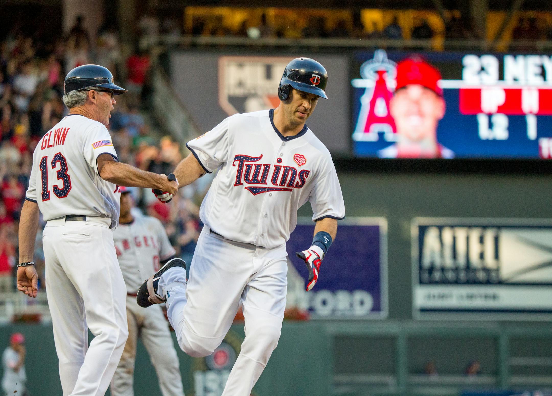 Minnesota Twins' Joe Mayer shakes Gene Glynn's hand while running the bases after hitting a homerun during a game against the Los Angeles Angels on Monday, July 3, 2017, at Target Field. ] COURTNEY PEDROZA &#x2022; courtney.pedroza@startribune.com July 3, 2017; Angels at Twins; Target Field;