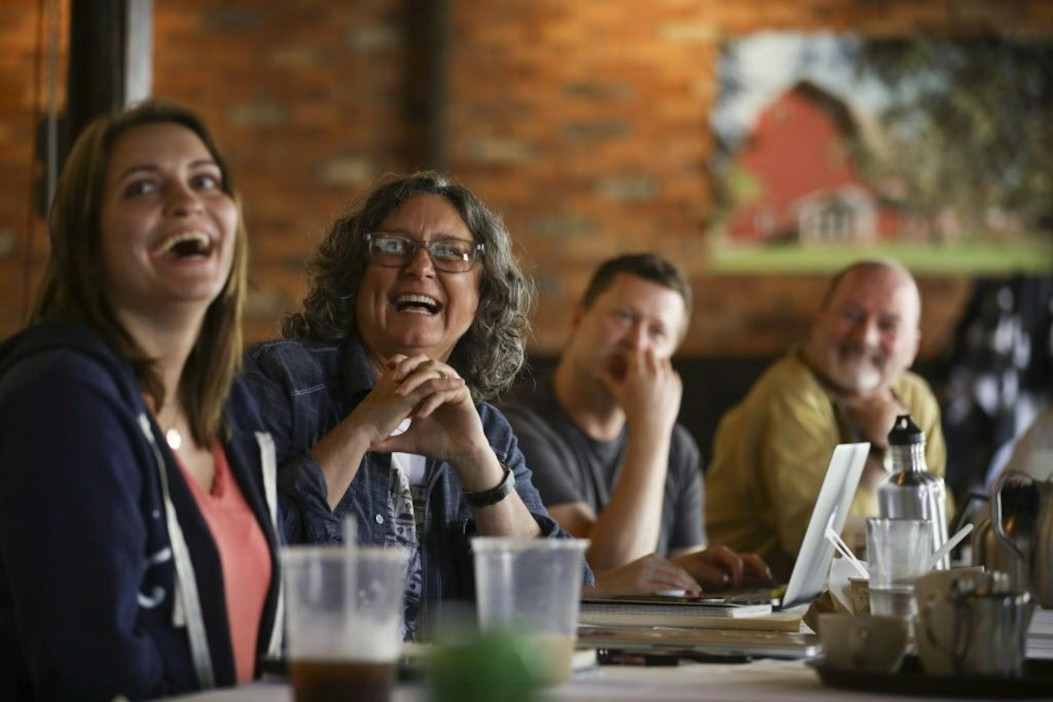 Kim Bartmann during the bi-weekly meeting of the chefs and managers of her restaurants, held this week at Red Stag Supperclub in Northeast Minneapolis. She was reacting to a photo being projected on a screen of the kitchen at Tiny Diner.