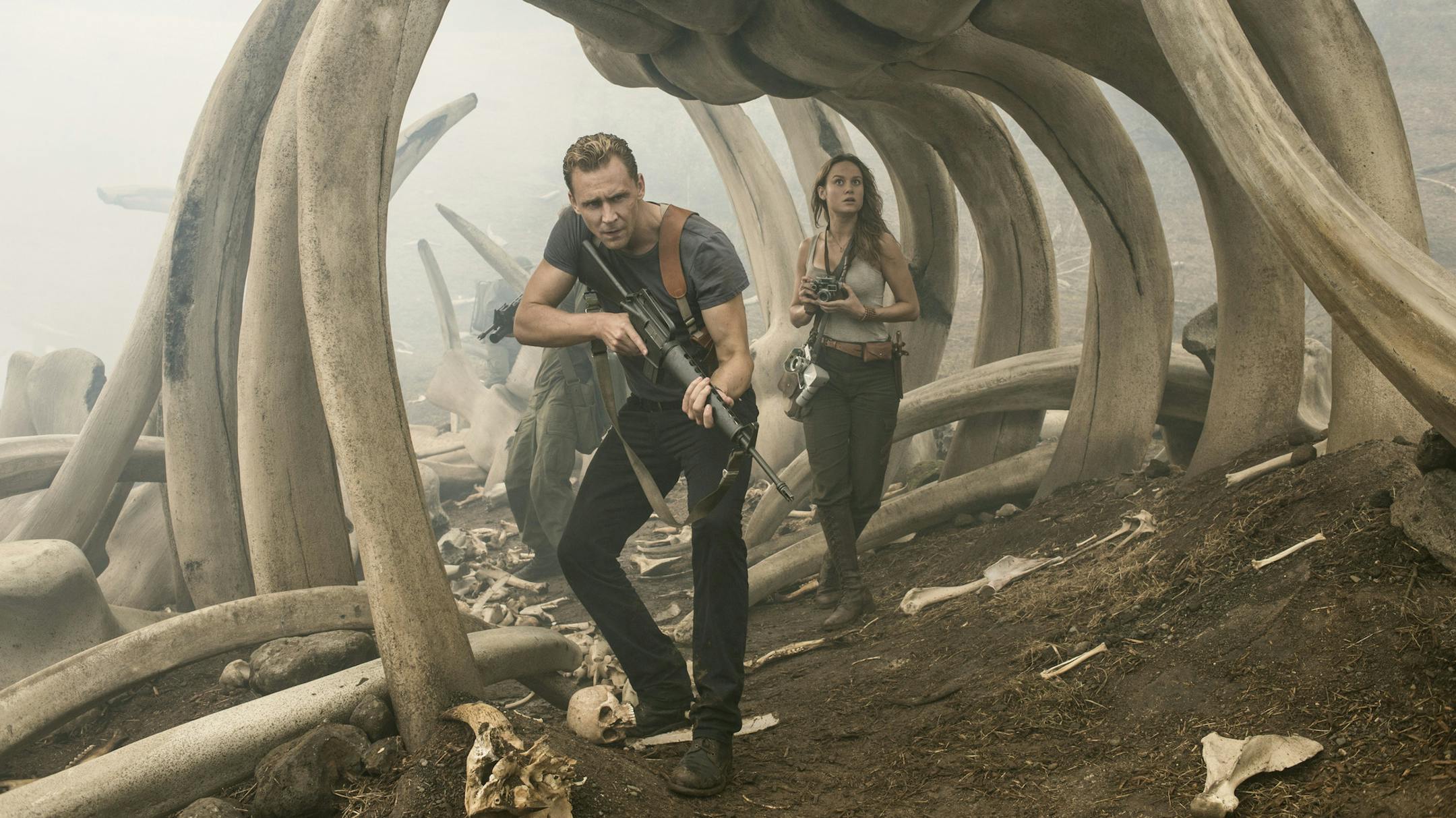 In this image released by Warner Bros. Pictures, Tom Hiddleston, left, and Brie Larson appear in a scene from, "Kong: Skull Island." (Vince Valitutti/Warner Bros. Pictures via AP)