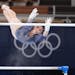 Suni Lee won the bronze medal in the uneven parallel bars competition Sunday at the Tokyo Olympics.