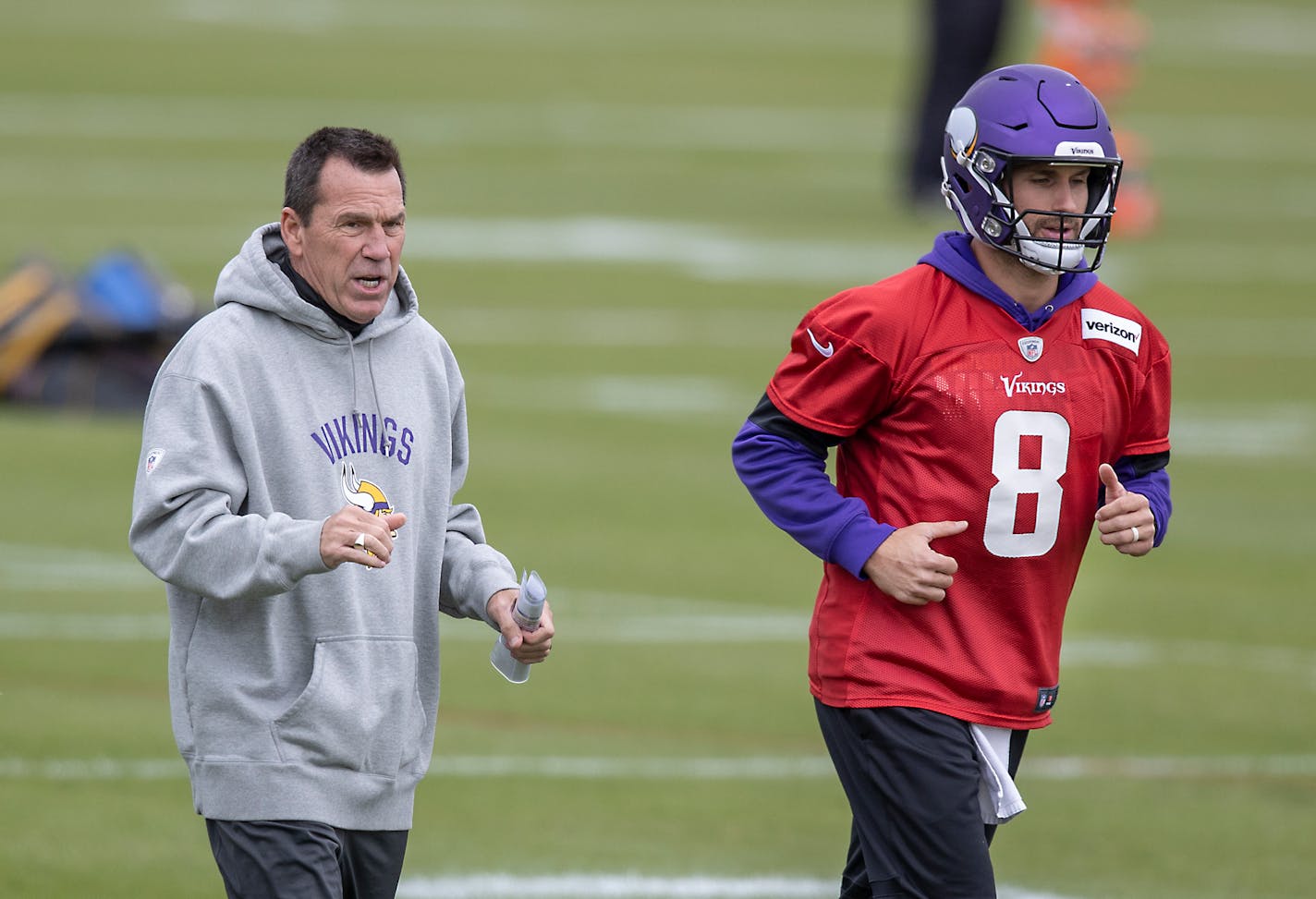 Minnesota Vikings Offensive Coordinator Gary Kubiak, left, and quarterback Kirk Cousins took to the field for practice at TCO Performance Center, Thursday, September 17, 2020 in Eagan, MN. ] ELIZABETH FLORES • liz.flores@startribune.com